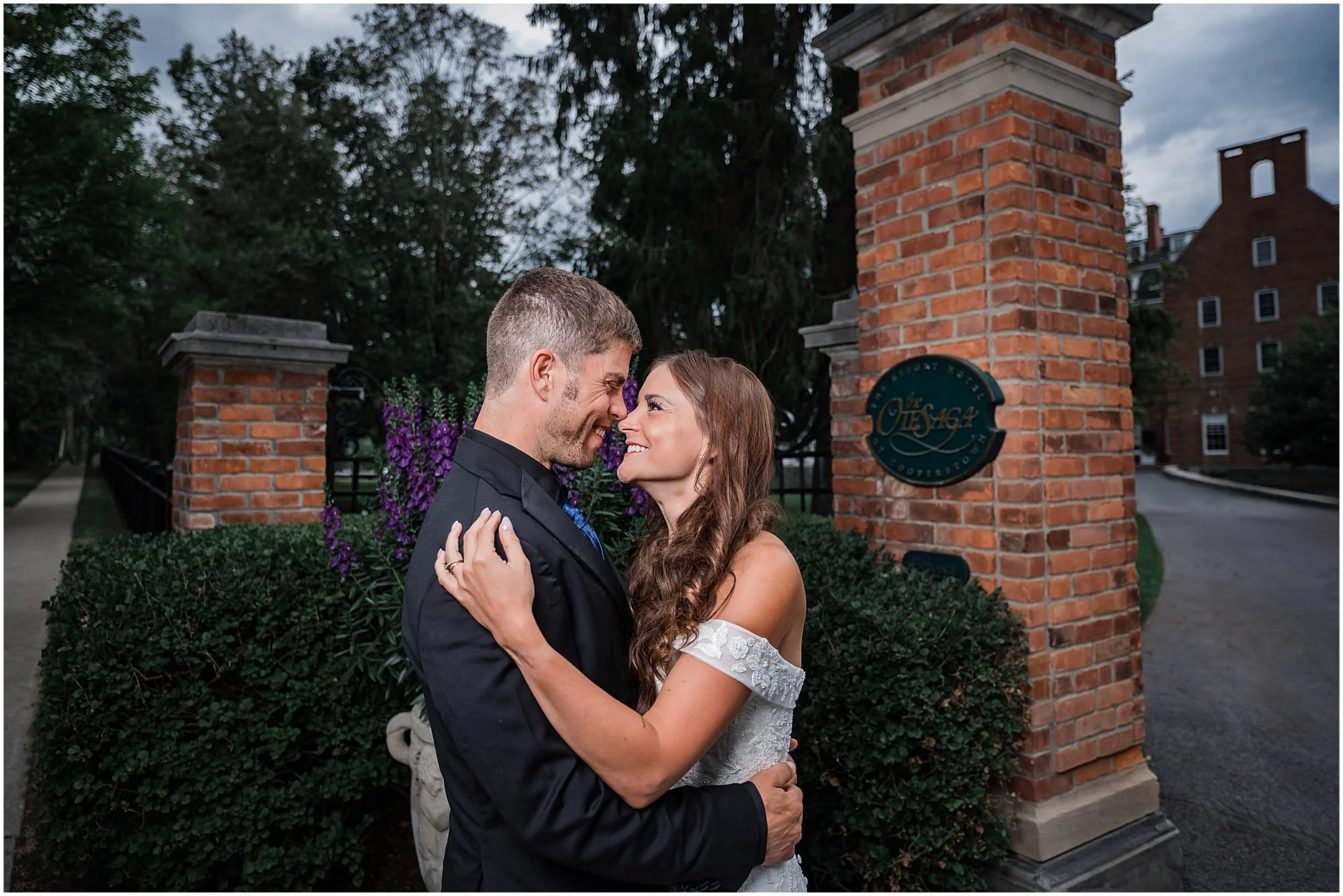 Bride and groom laughing together during their intimate Cooperstown elopement.
