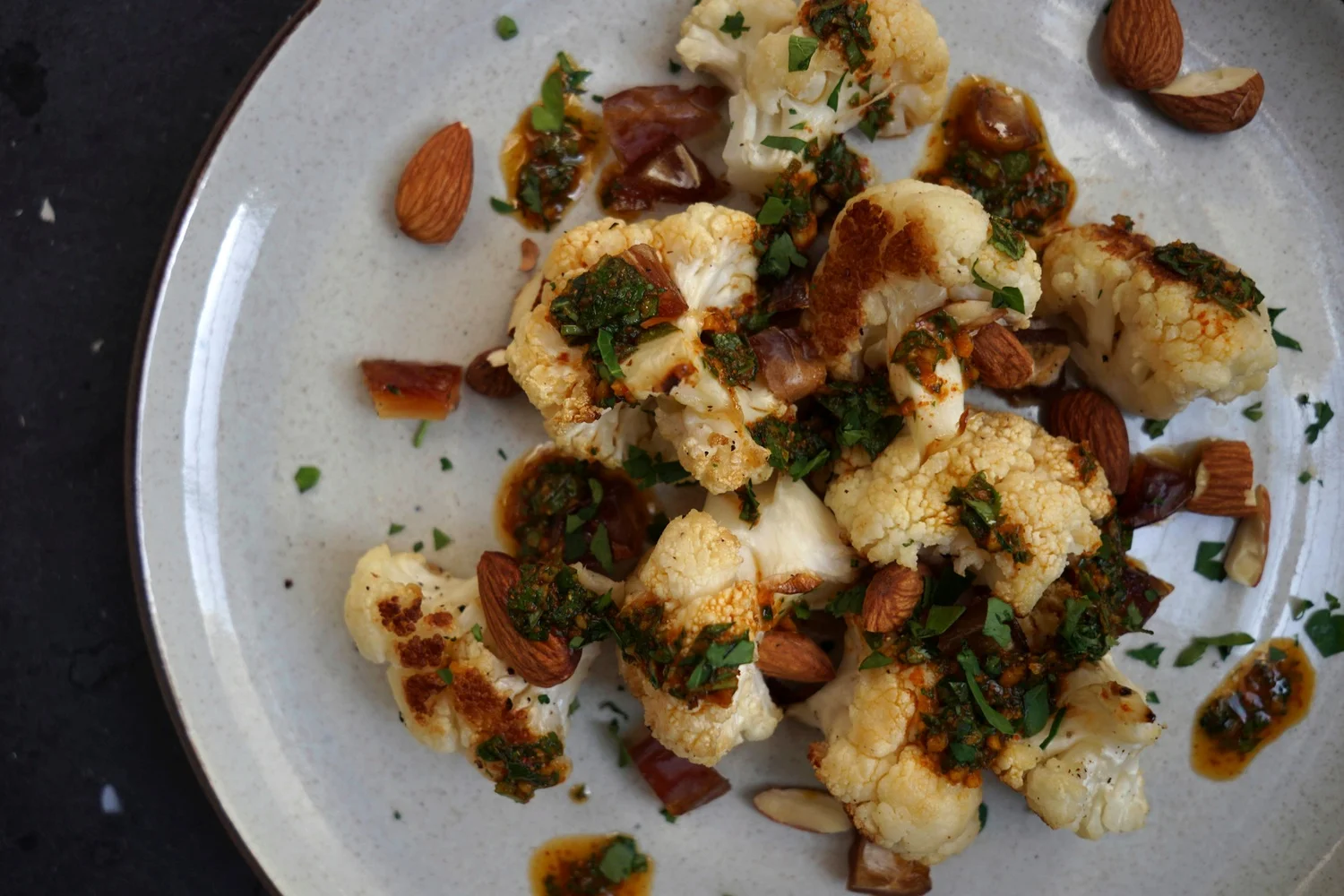 Roasted Cauliflower, Dates &amp; Almonds with Herbed Moroccan Saffron Sauce