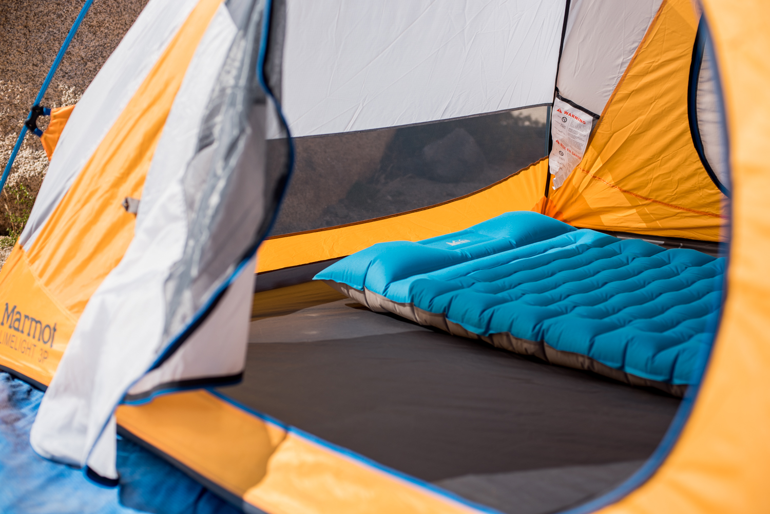 Plenty of room for two sleeping pads, with space left over on all sides. Doors on both sides for easy access to all inhabitants.