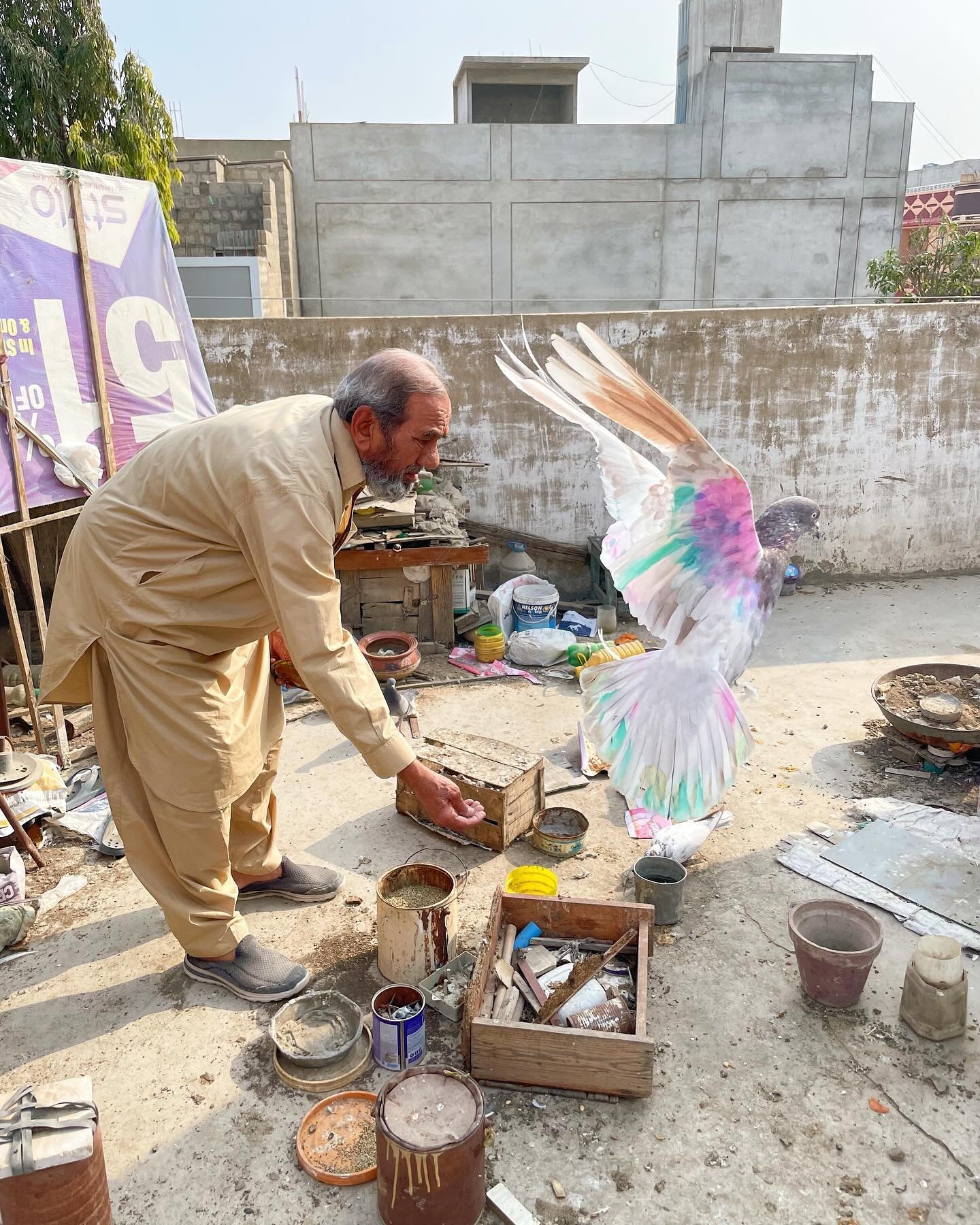 My uncle feeding his beloved pigeons 🕊️ 

This is my favorite photo from my Pakistan trip &hearts;️