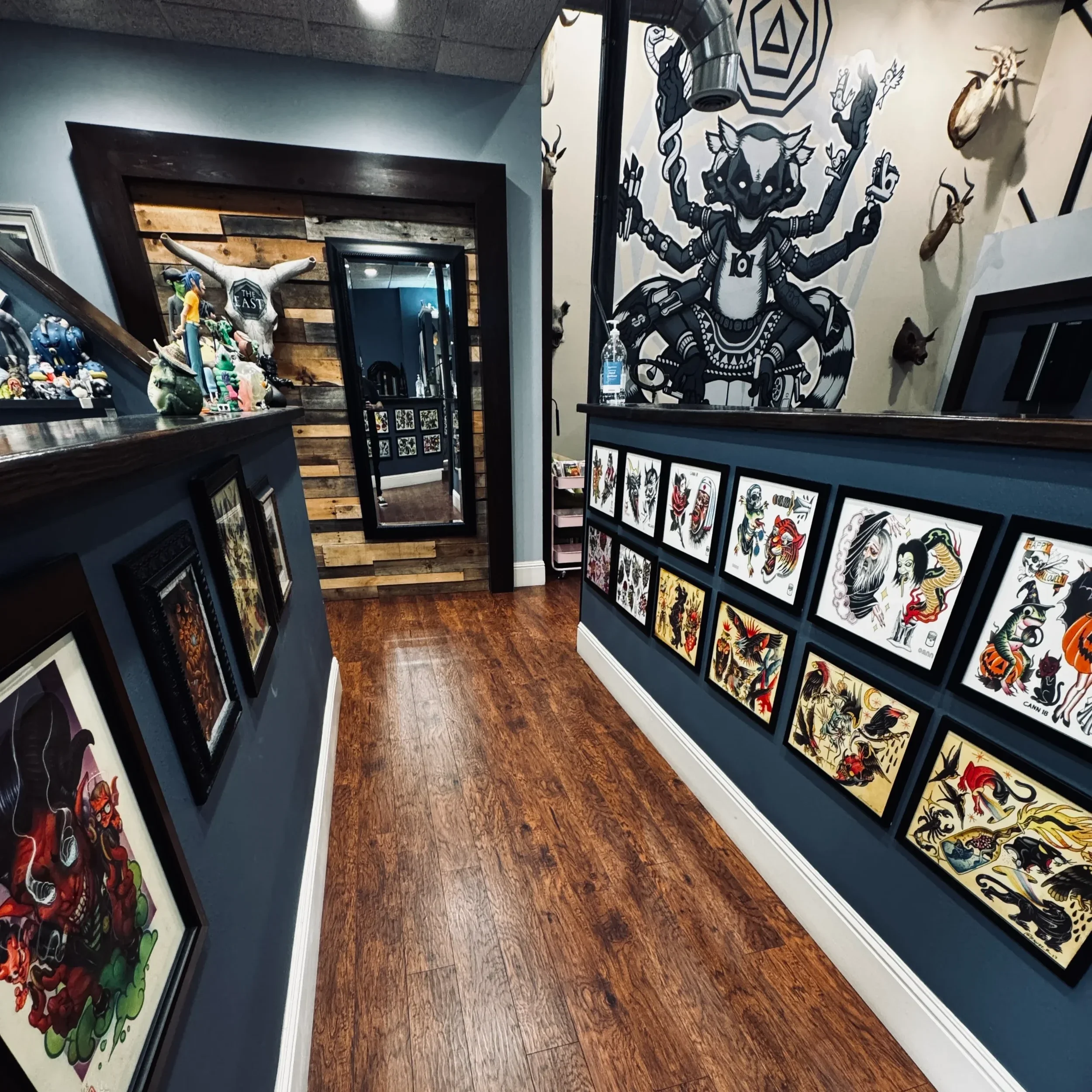 Tattoo flash, taxidermy and a mirror