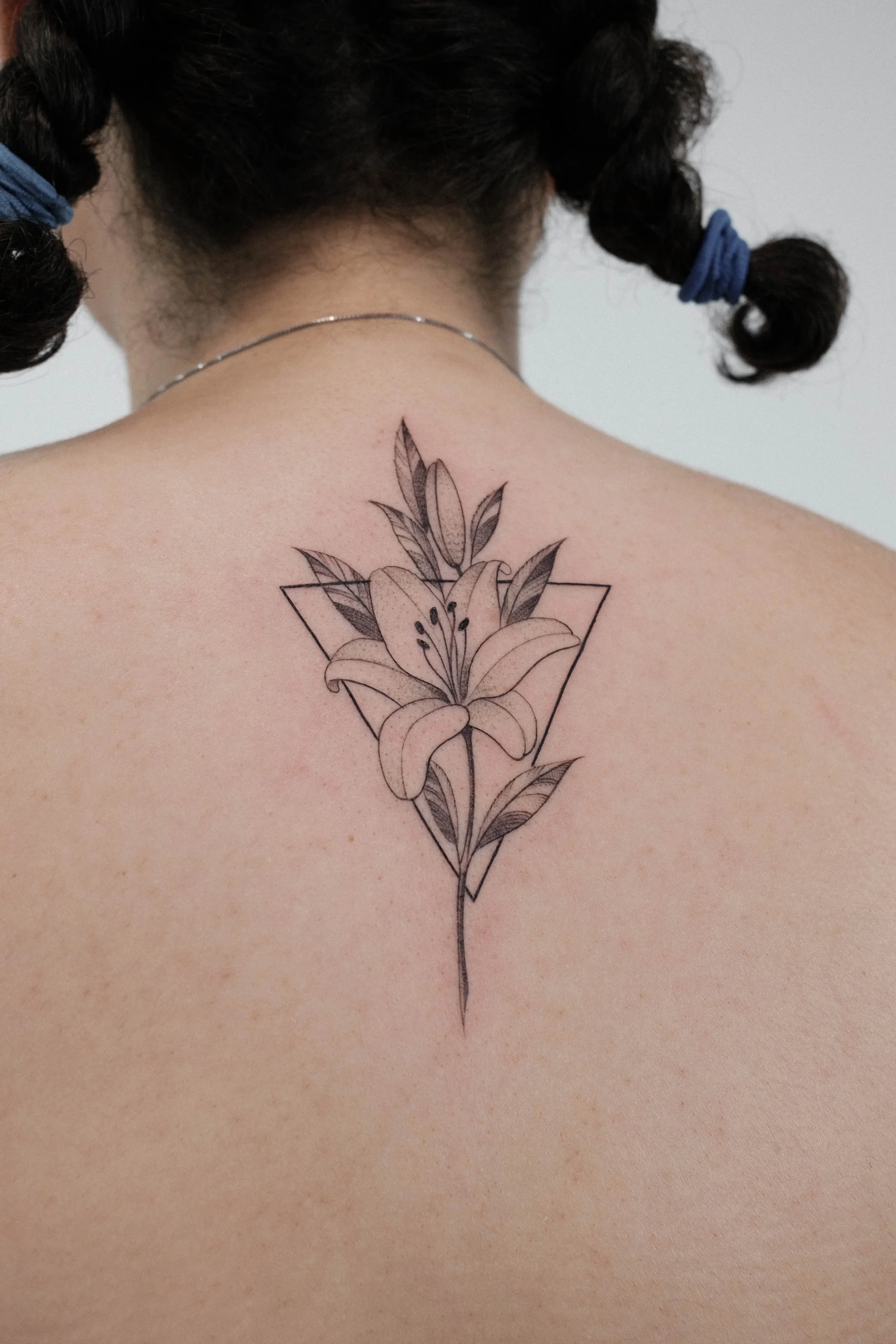 Lily Fine Line Tattoo by Gabe Feliciano at The East Tattoo in Orlando Florida 