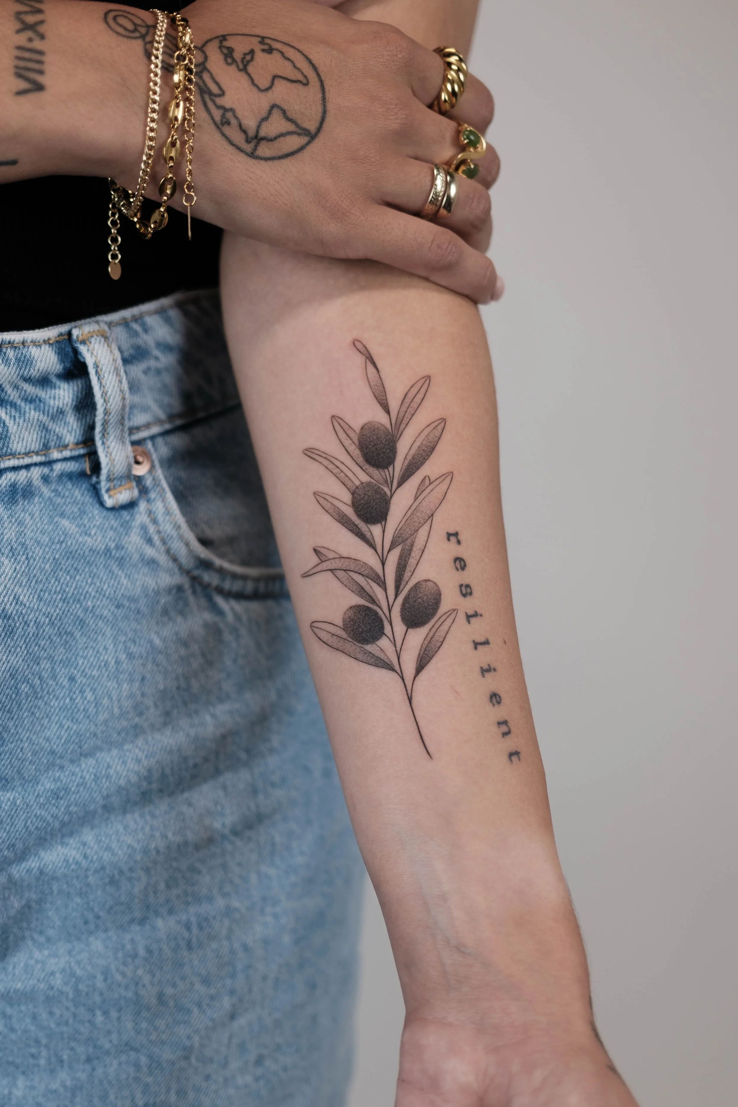 Olive Branch Fine Line Tattoo by Gabe Feliciano at The East Tattoo in Orlando Florida 