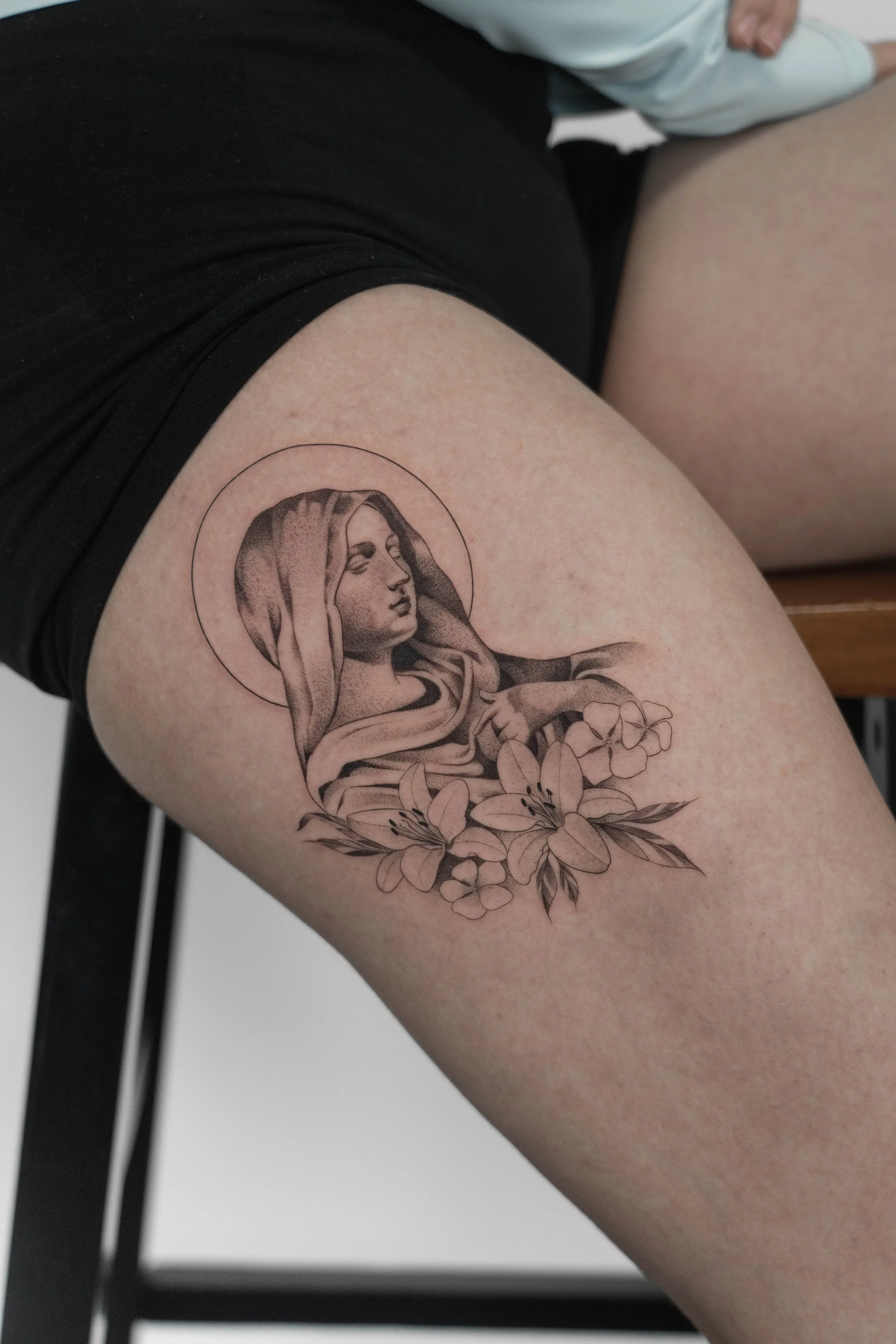 Mother Mary Fine Line Tattoo by Gabe Feliciano at The East Tattoo in Orlando Florida 