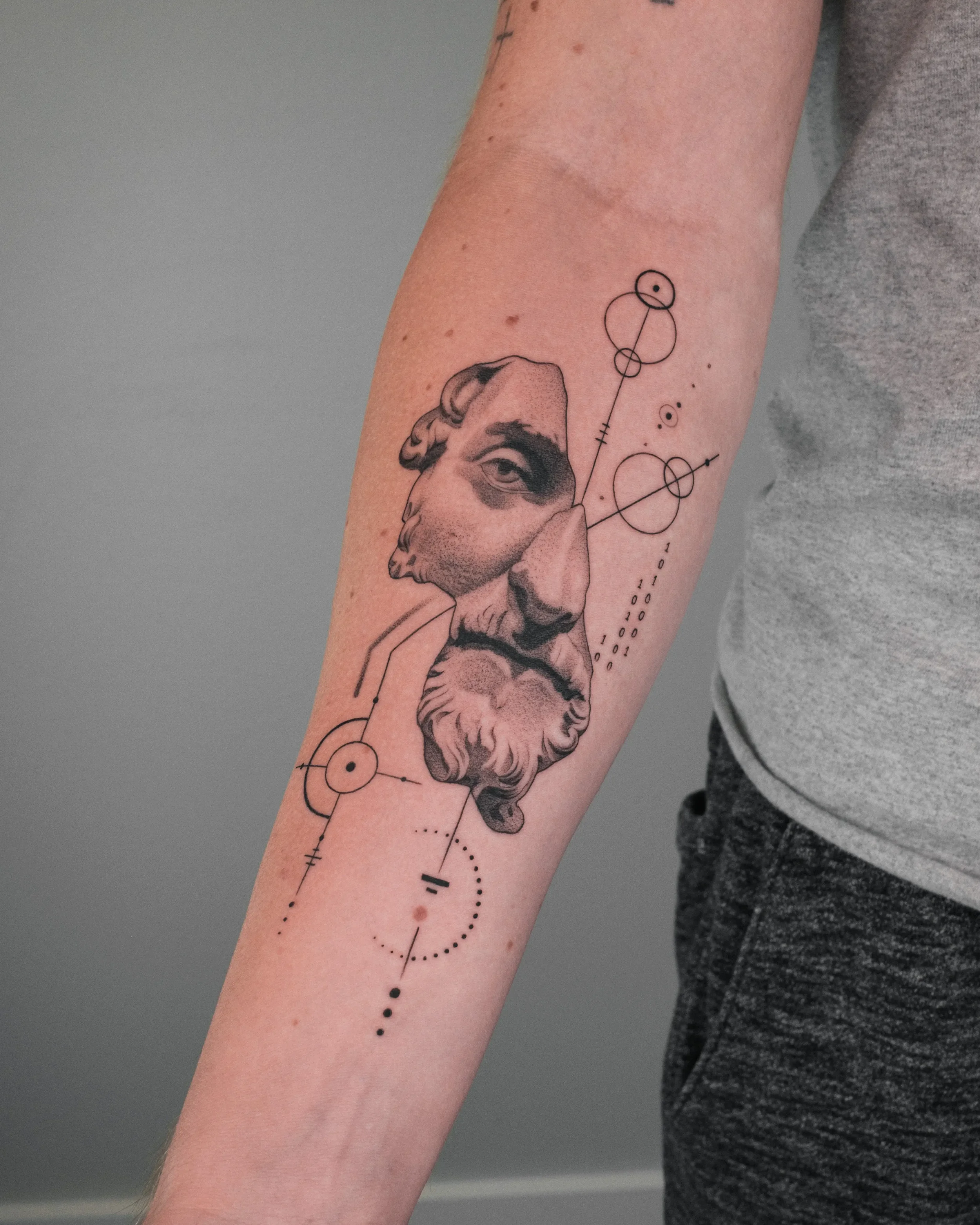 Statue Fragment Fine Line Tattoo by Gabe Feliciano at The East Tattoo in Orlando Florida 