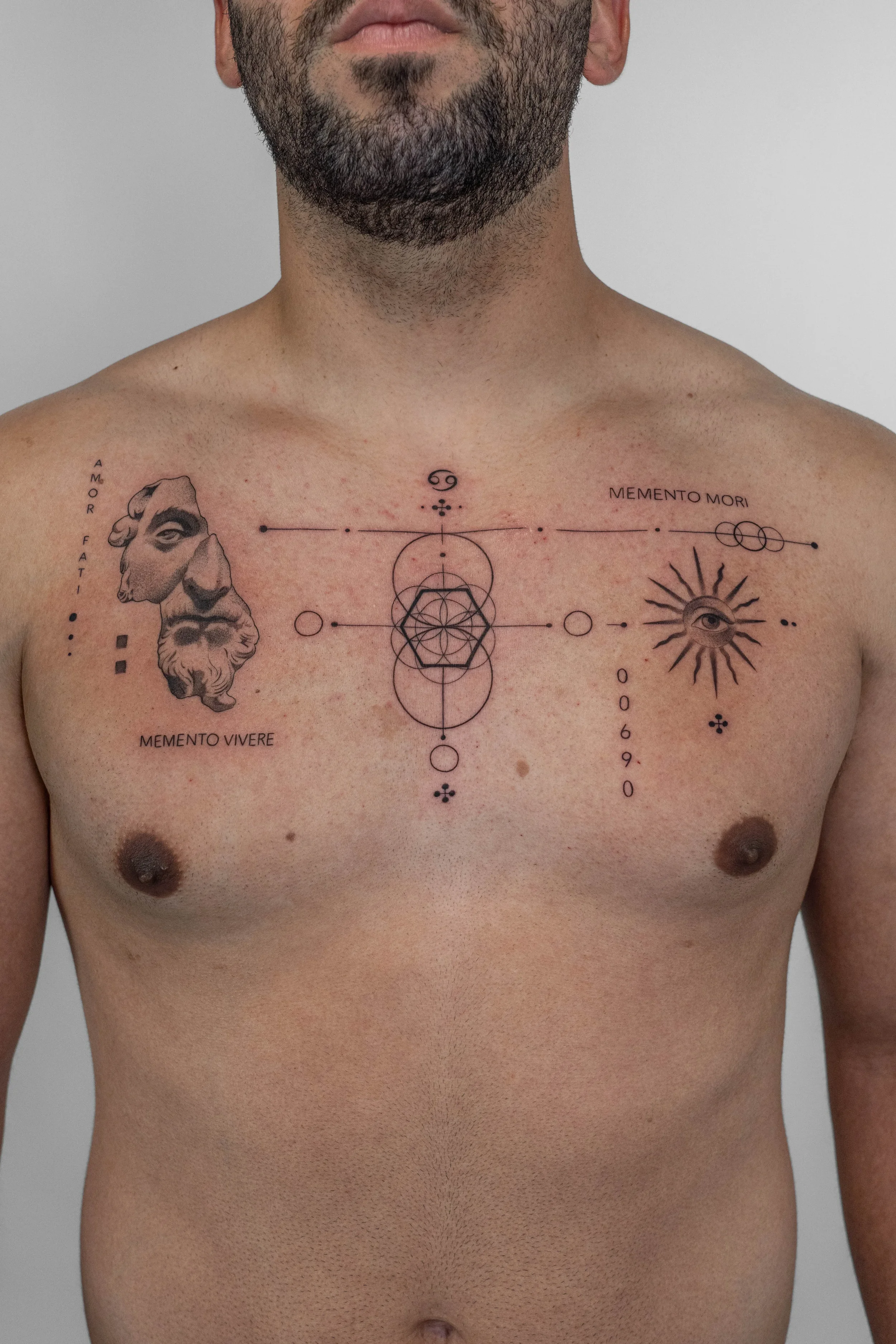 Fragments and ideas Fine Line Tattoo by Gabe Feliciano at The East Tattoo in Orlando Florida 