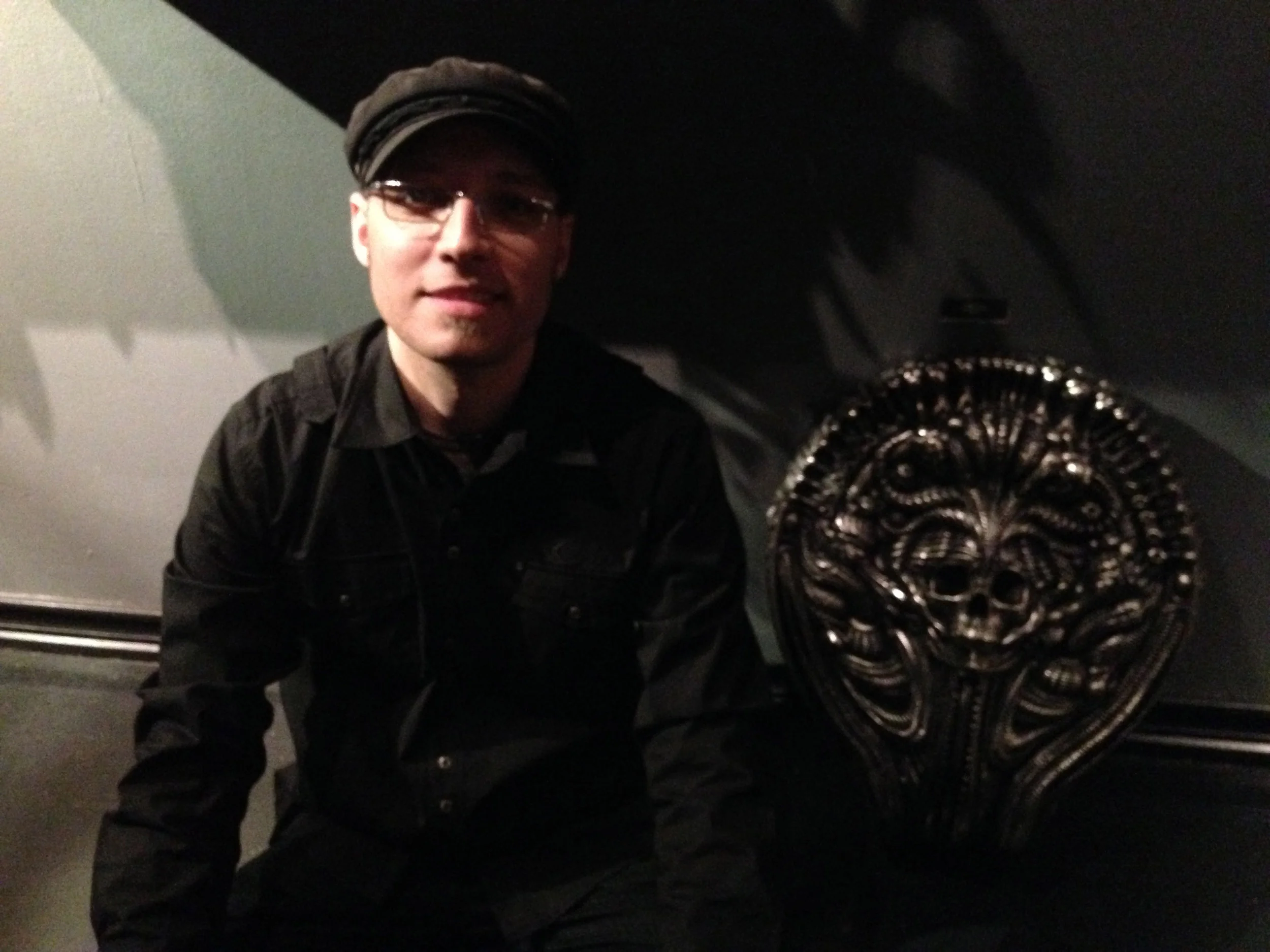 Me at opening reception at the Copro Gallery back in January of 2014. Unfortunately the piece did not make it on the wall. 45 pounds was just do heavy for them to hang I guess. I had no problem with this at my house. At first they put it on top of a metal trash can. I couldn't handle that and moved it to the floor. So there I am, sitting on the floor with my 1000 + hour, 6K sculpture behind me. Feeling disappointed is an understatement.
