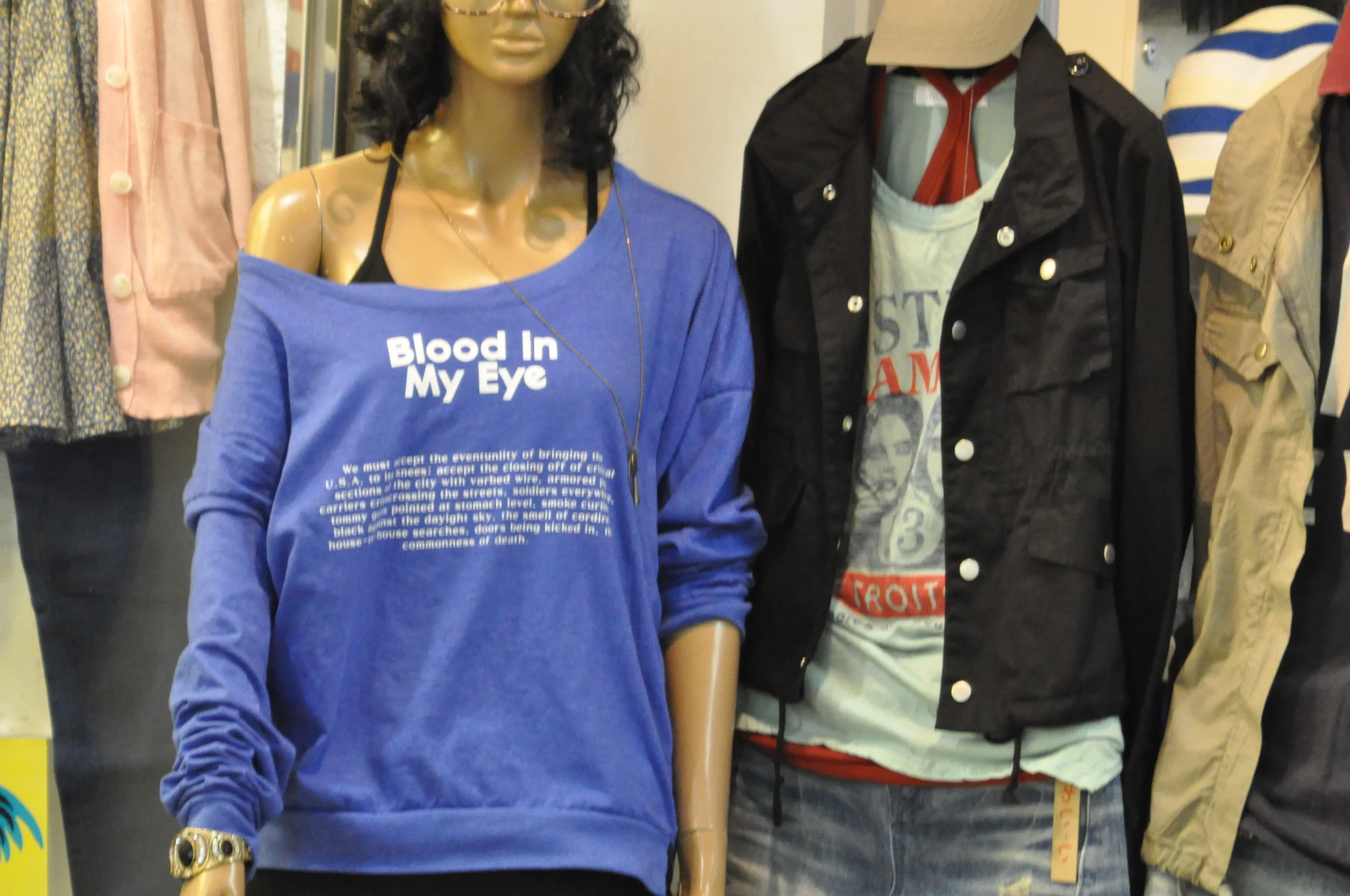 In two years I never found a single shirt with Hanguk (Korean language). It was all English.