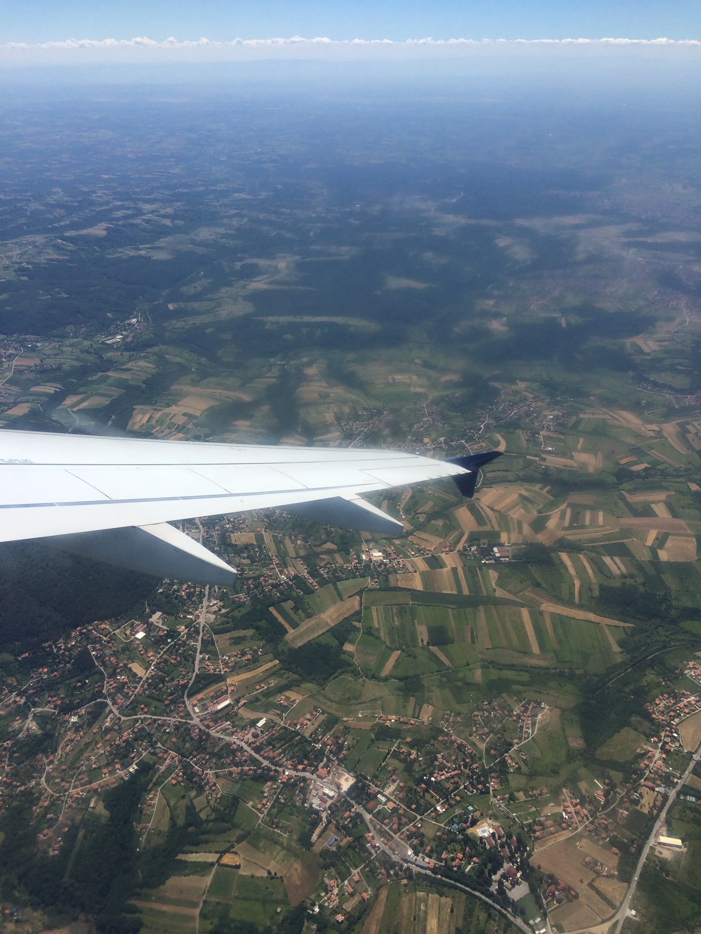 In flight over green fields, somewhere between Belgrade and Athens