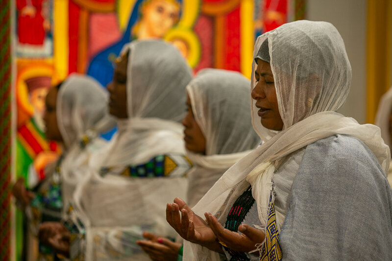 The church, with its beautiful and colorful paintings, provides the perfect backdrop to the services.  Most congregants are dressed in the Habesha Kemis, a traditional linen made of Ethiopian cotton.
