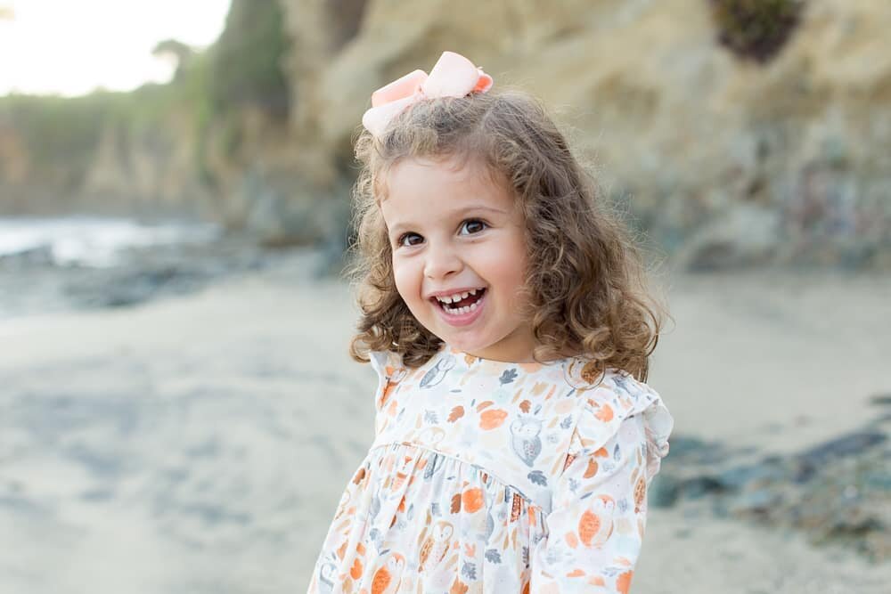 She has a smile that lights up a room...and a beach! 💕 I really love capturing each kid's personality! 📸 @christinaithurburn
..
.
. 
#beaubellephotography # bpkids #bpfamilies #ocfamily #ocfamilyphotographer #familyphotographer #beaubellephotos #mo