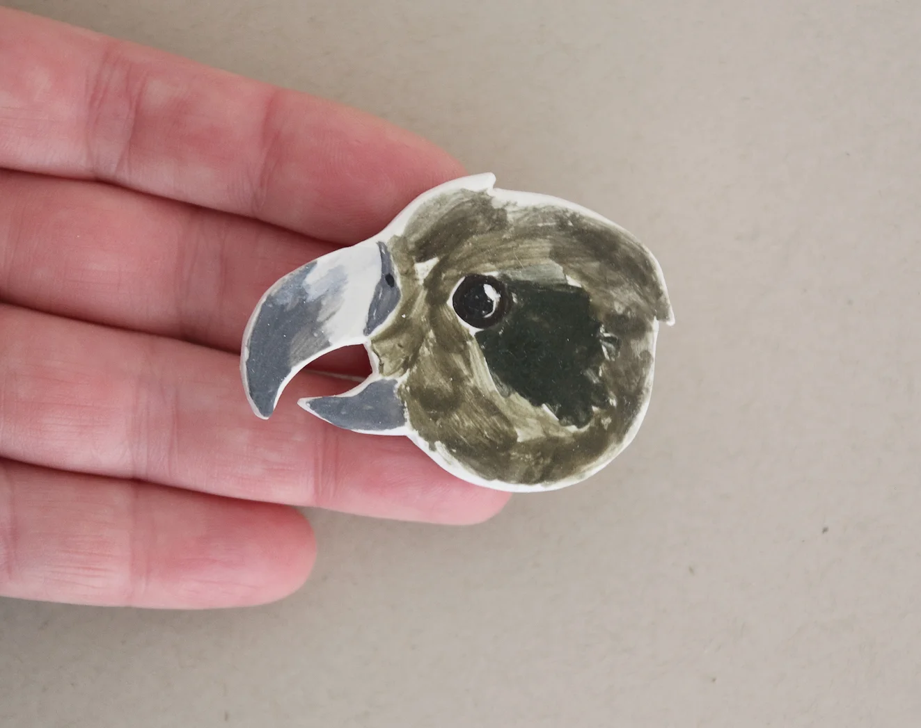 melissa boardman brooch kea in hand.jpg