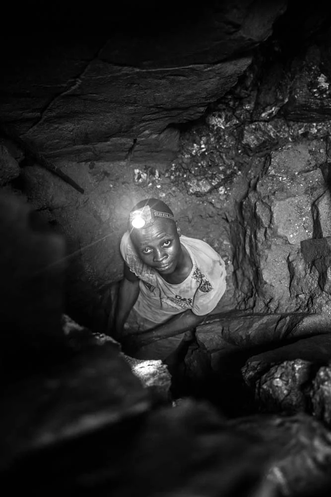 A mine worker in his twenties at work in a cassiterite mine in the South-Kivu province in the Democratic Republic of Congo