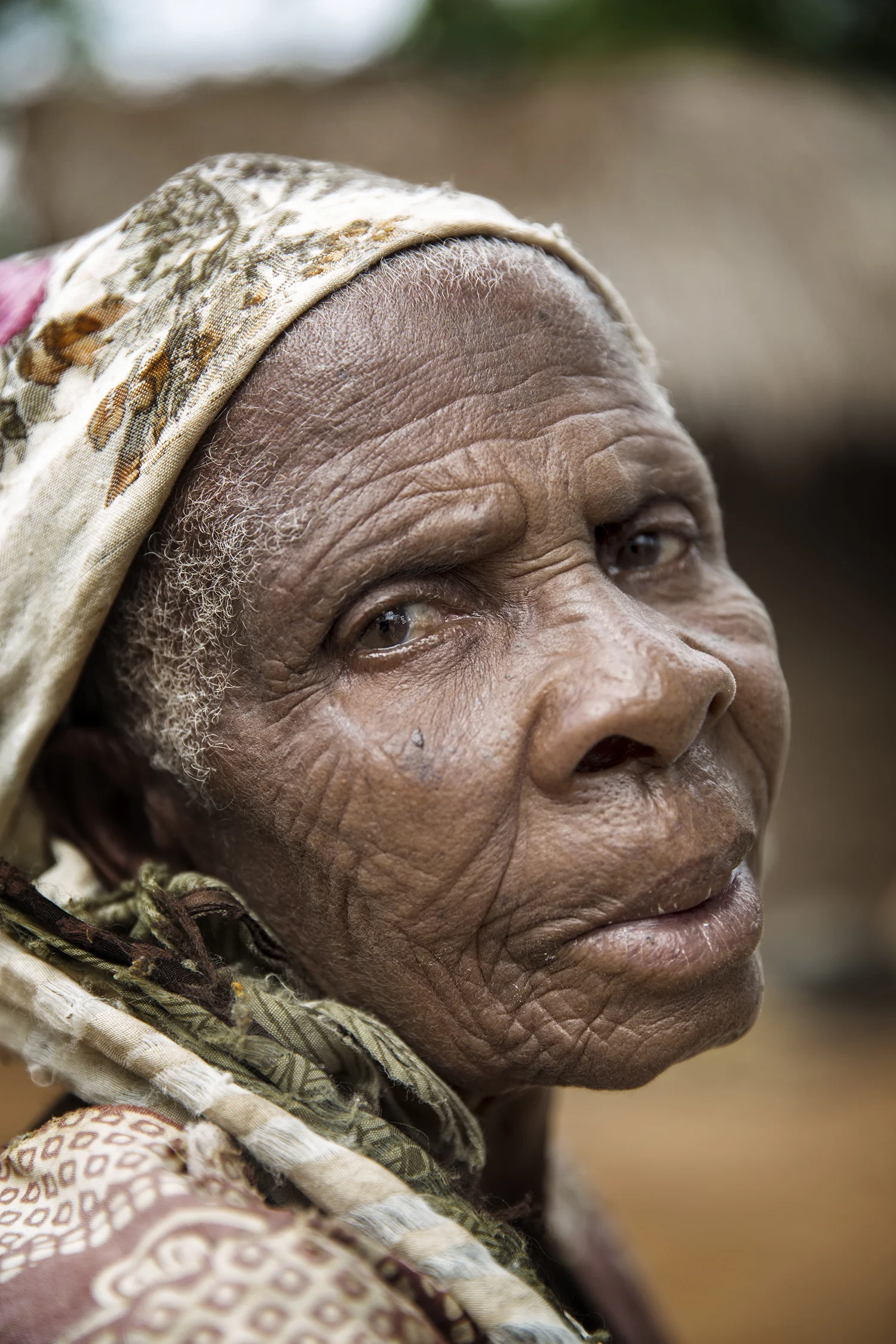 Mariam Sekaya: "We largely depend on farmers in the area to give us cassava leaves to cook. Fortunately, I have a few goats that I can sell to pay my hospital bills."