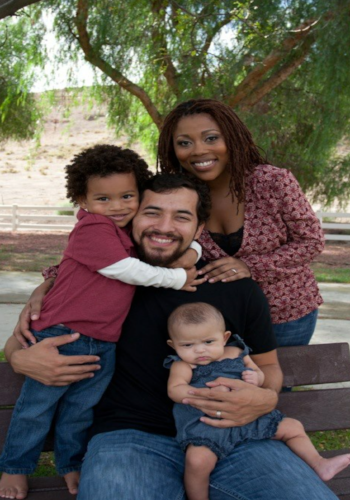 Aaron Ramirez Aaron is wonderful with kids, it's evident by the look of this picture. He's a great father, coach, teacher, and mentor. He loves teaching kids all aspects of physical movement like biking, soccer, and yoga. He has a keen ability to get down to their level to help children really understand the lesson he's teaching. He also does wonders with helping people feel better through his business as a licensed masseuse.