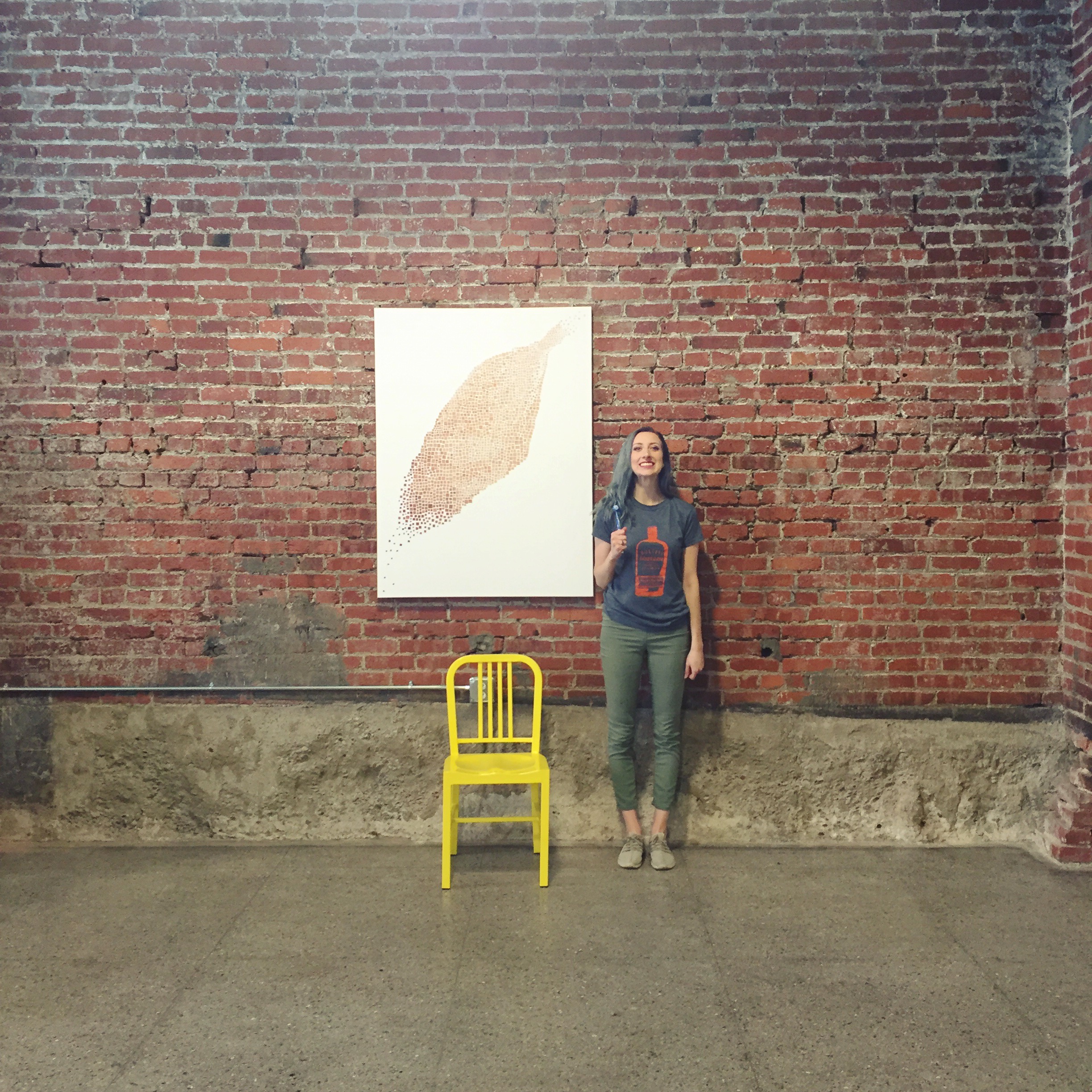 My awesome bud, Michelle Montana, after hanging this 5 foot beast. We hung a show in this space in October, so it was a great experience to be in it again. 