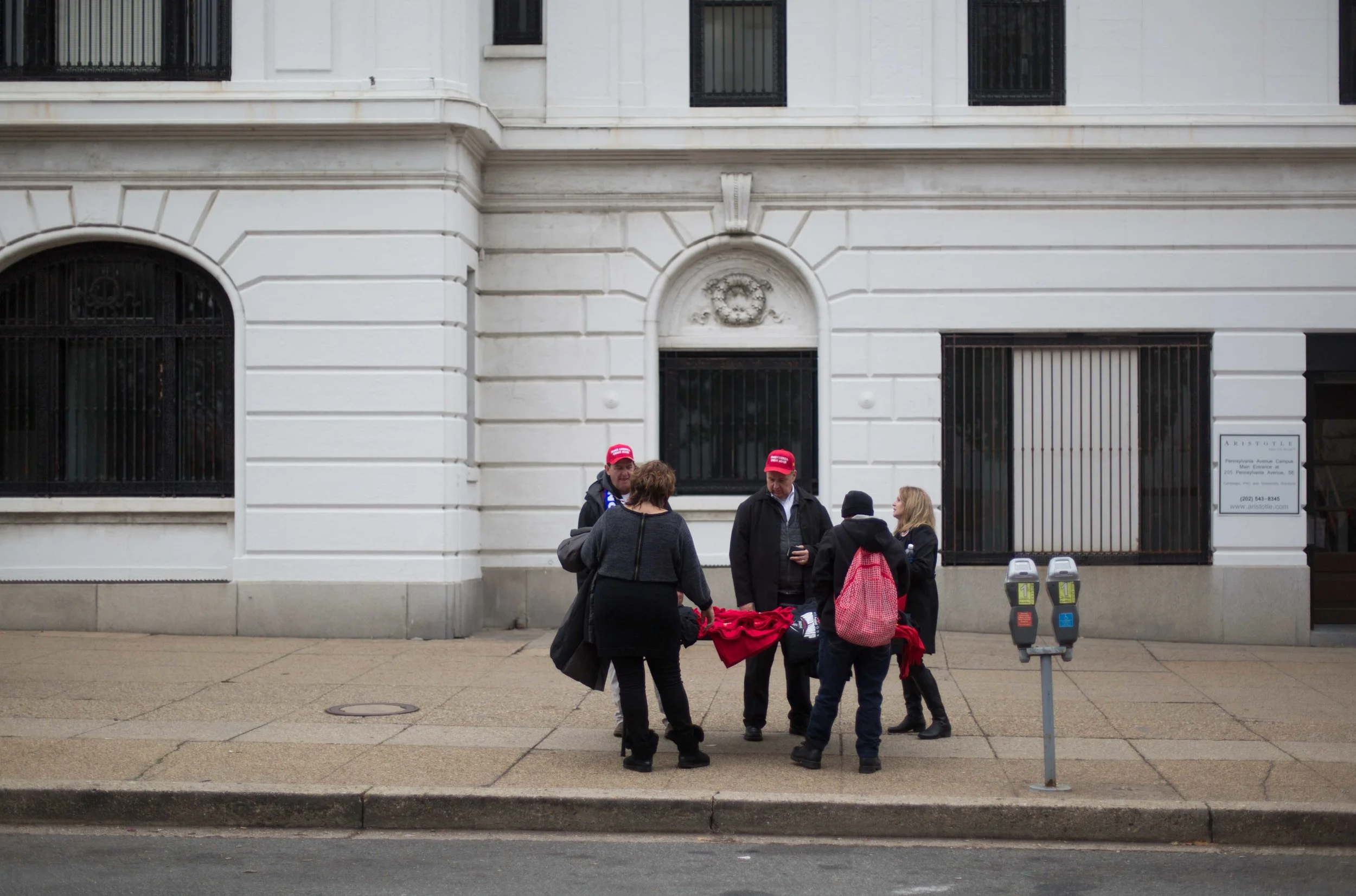 Another deserted scene, right off the inauguration route - three supporters buy Trump merchandise from a street vendor. One of the supporters laughed about the origin of the garments with me and Rachel, thinking we were Pro-Trump, saying, "Everything's from Mexico - can you believe it??"