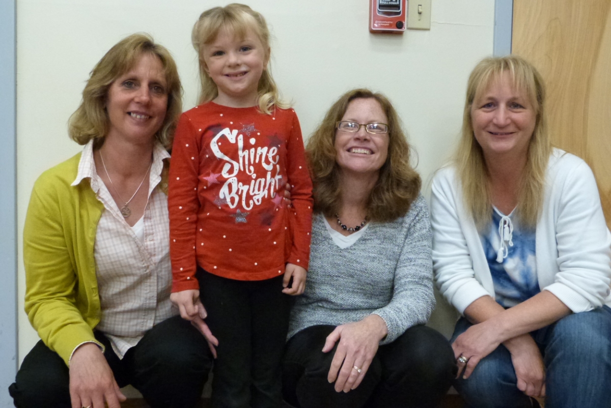 Our Preschool Staff with one of our students.(L to R) Kerry Gallup, Director, Jean DeMelim, Lead teacher & Kym Coffey, Teachers Aide