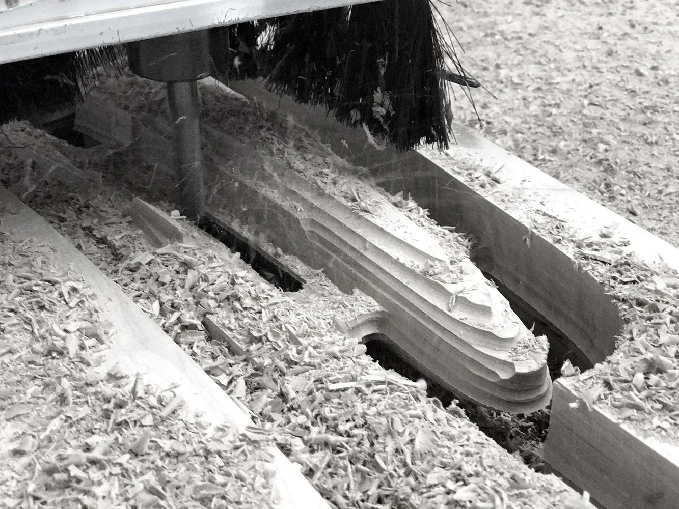 CNC machine cutting part of the chair out