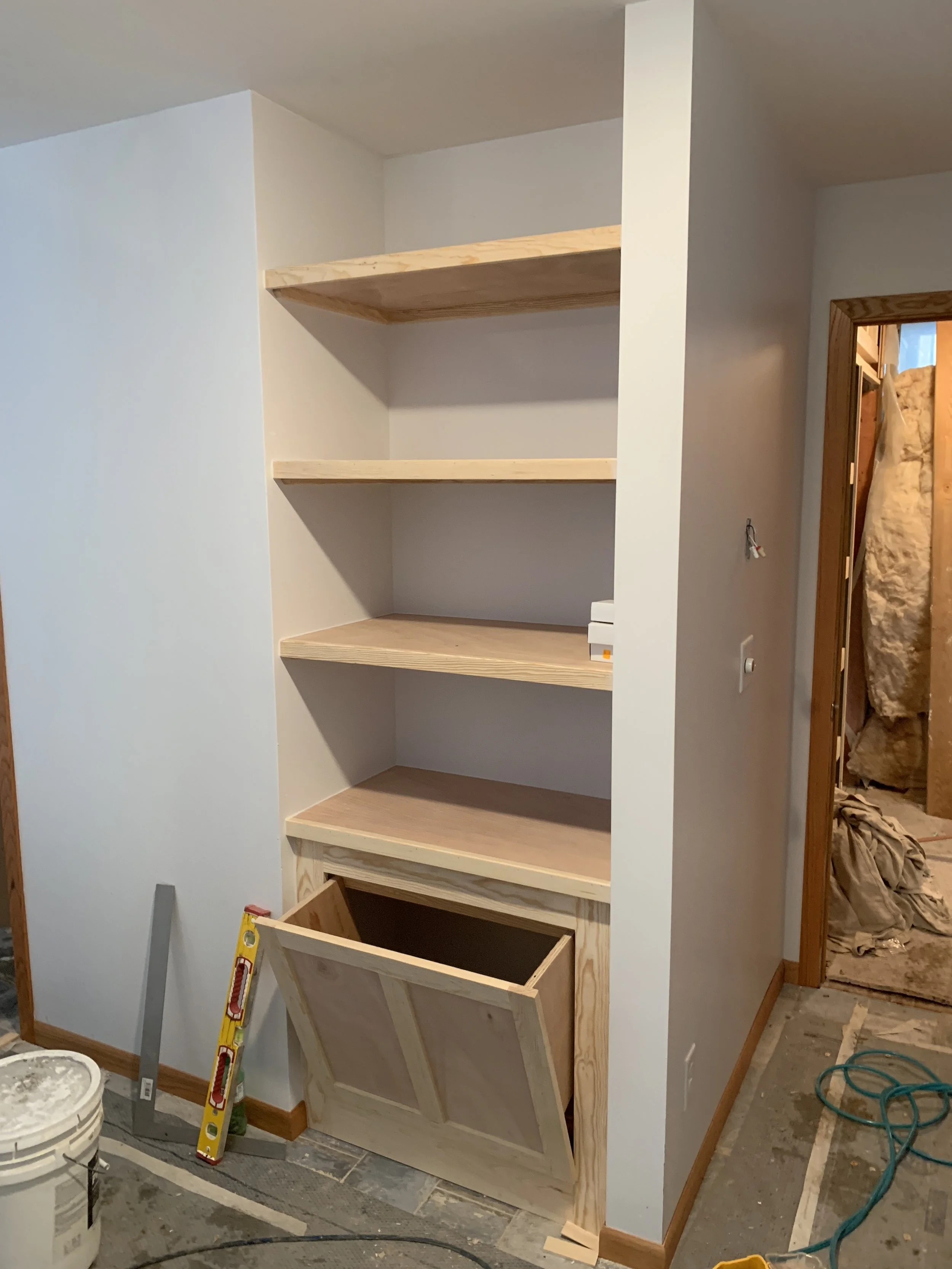 Built in Bookshelf and Hidden Laundry Chute