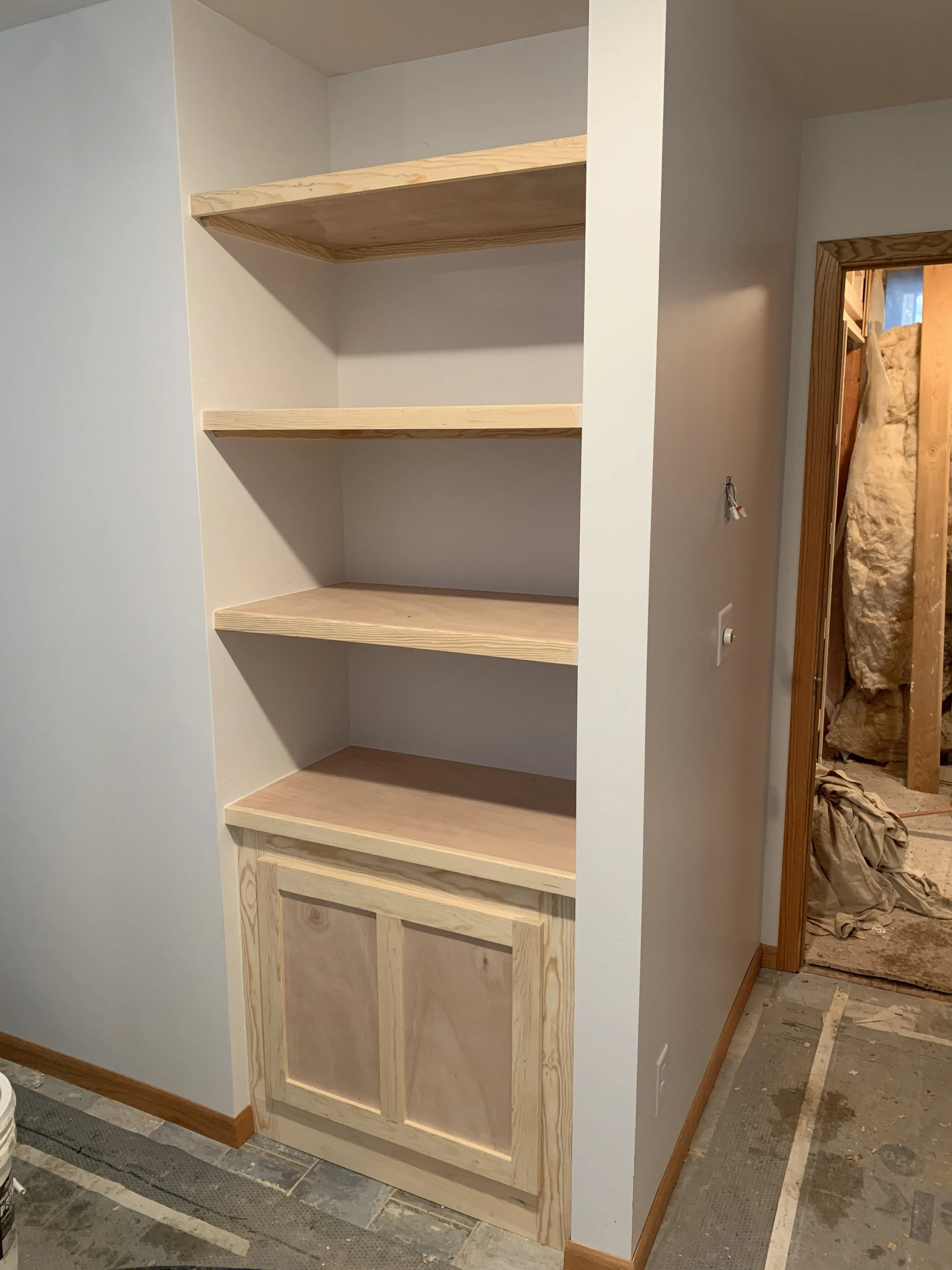 Built in Bookshelf and Hidden Laundry Chute