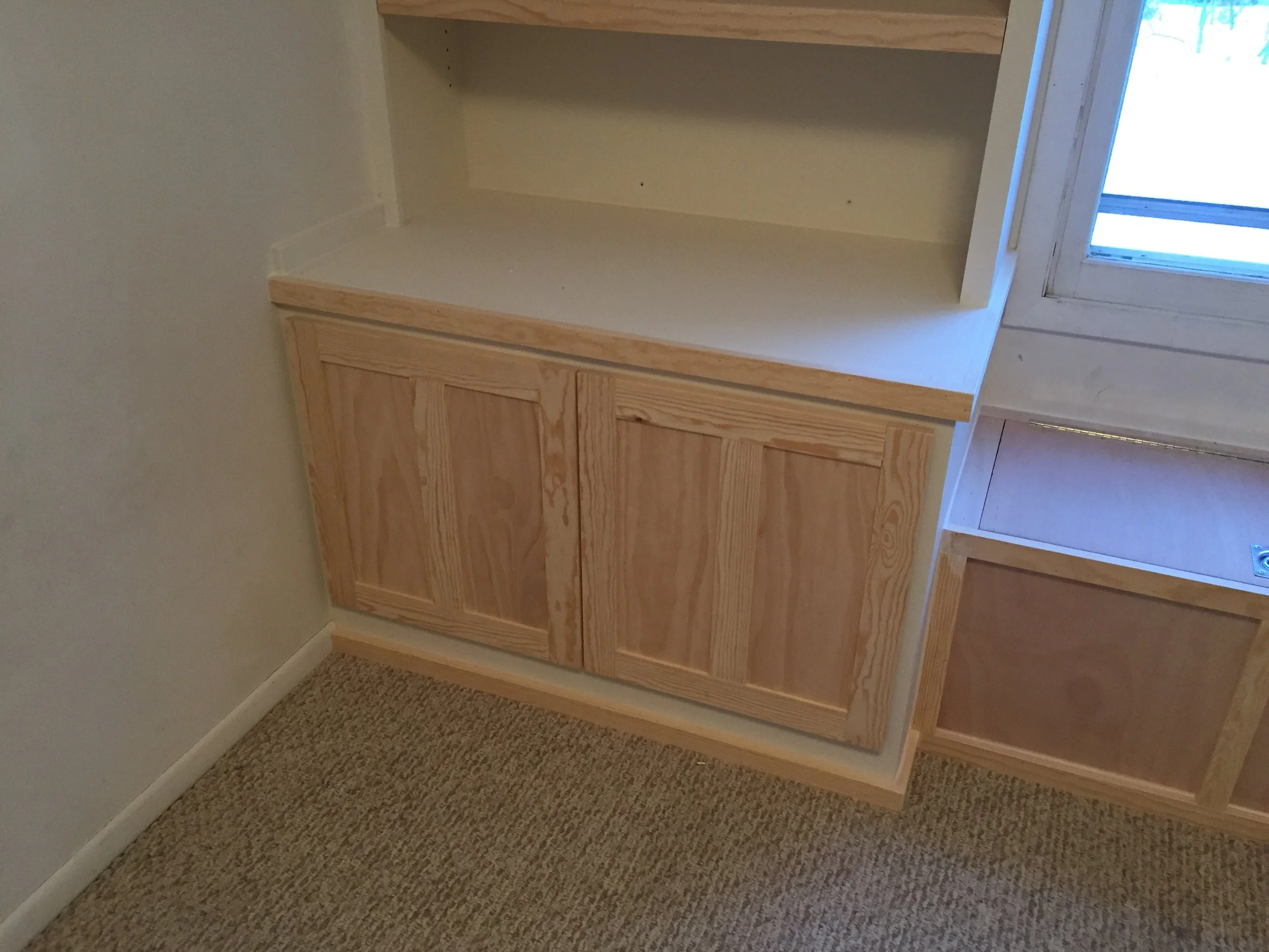 Custom Built in Bookshelf with Seating