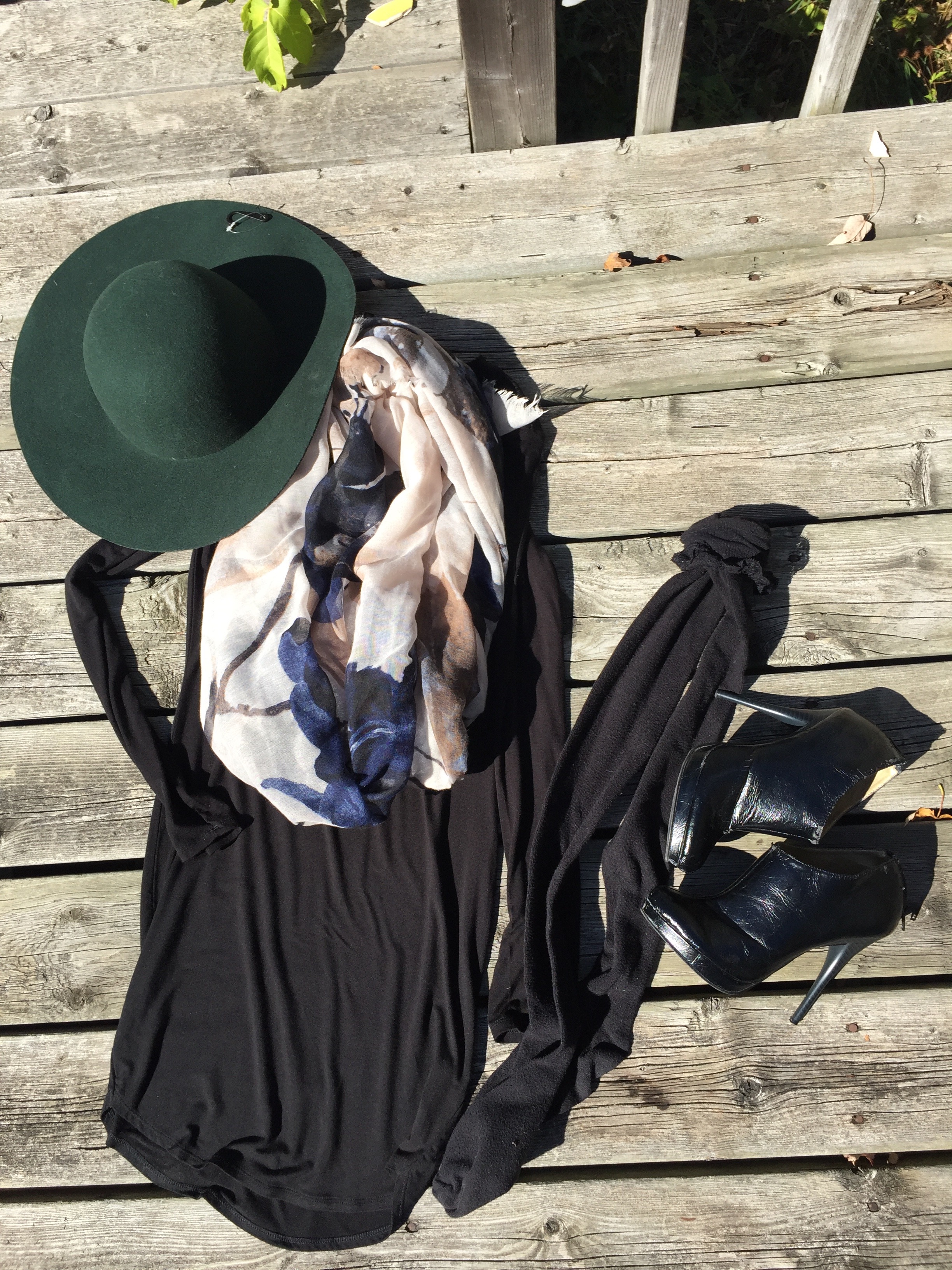 Black Long Sleeve Dress with knee high socks, black booties, a scarf and hunter green floppy hat