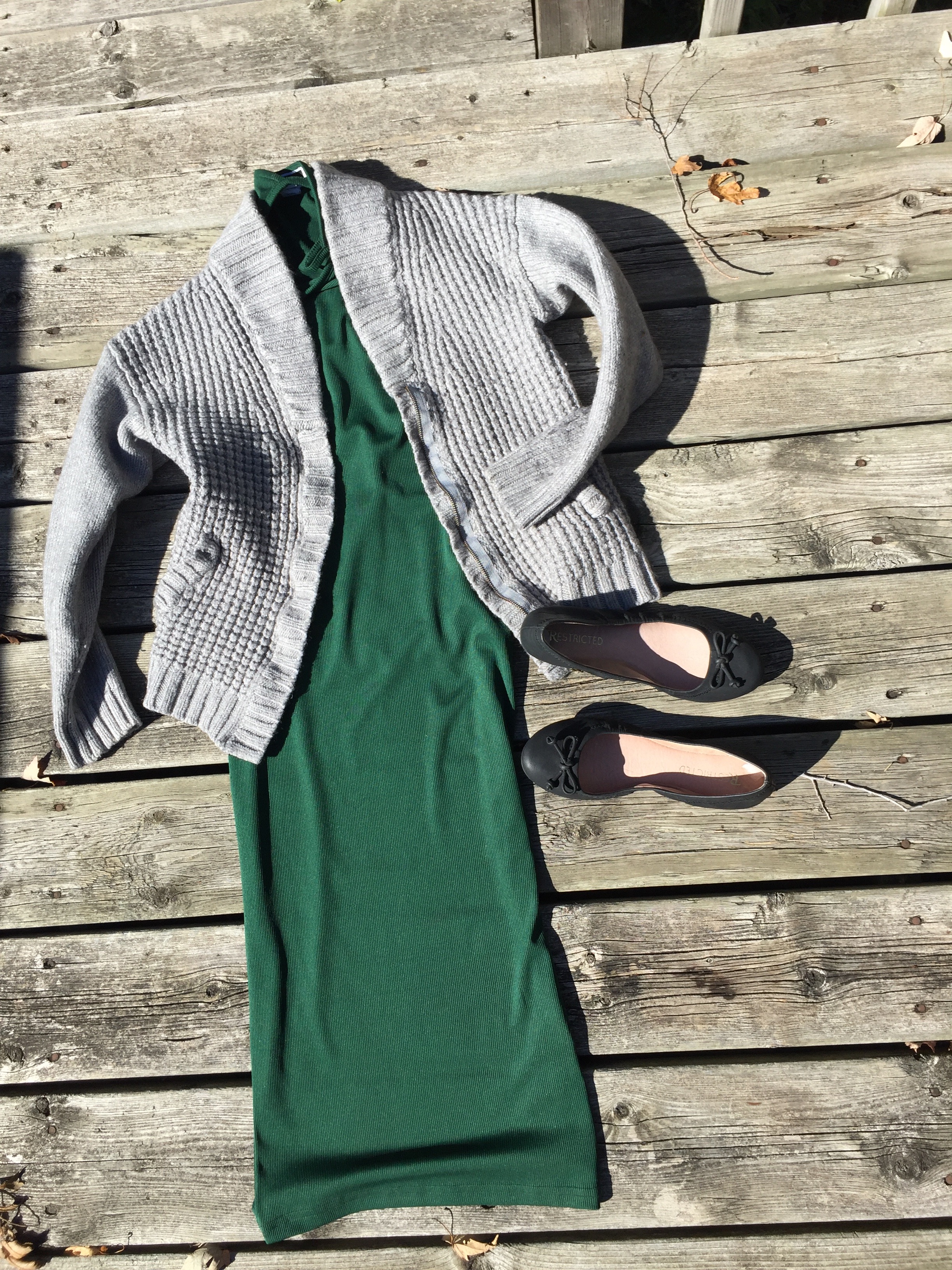 Green midi dress with grey grampa style sweater and black flats