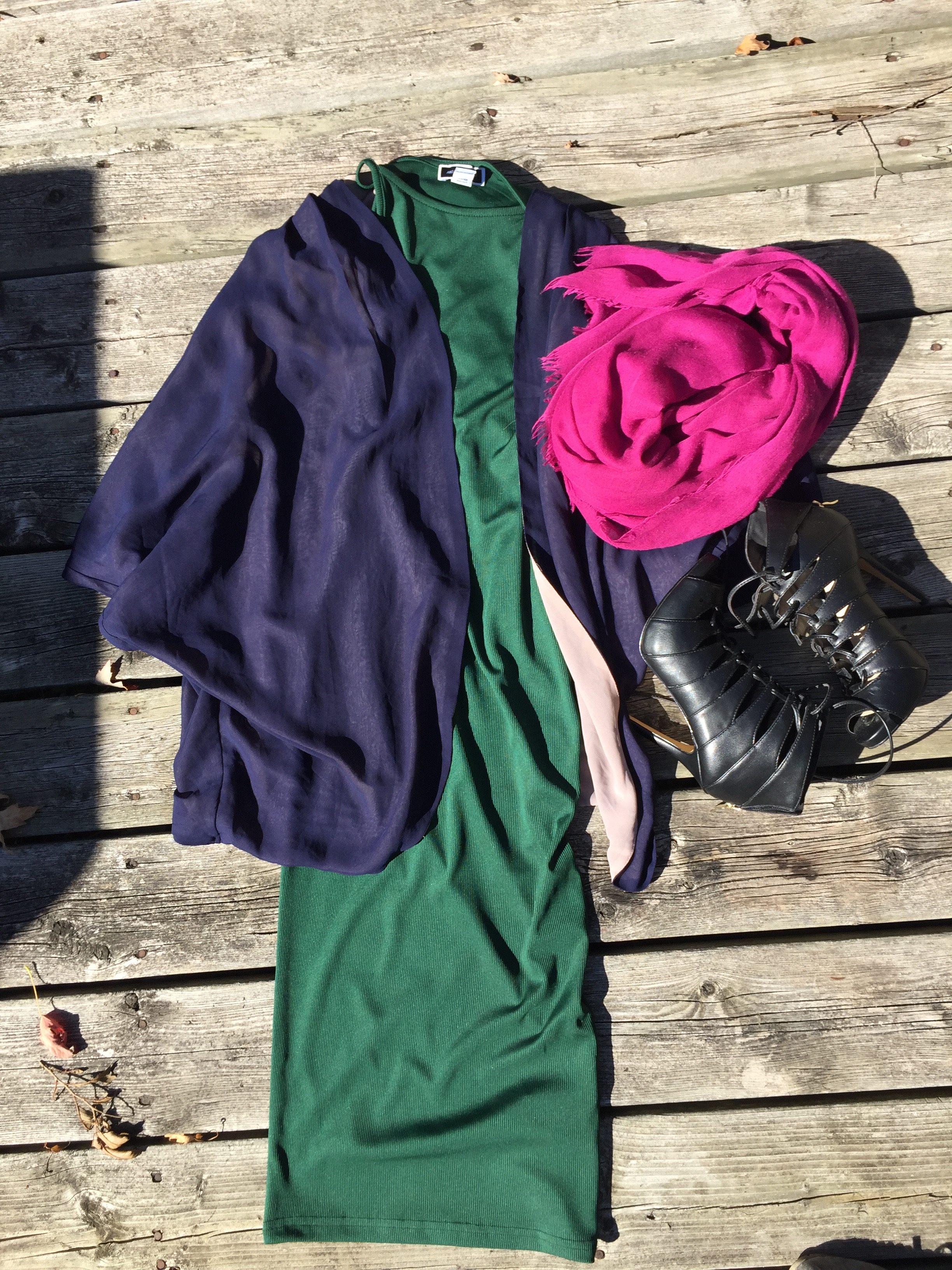 Green midi dress with purple kimono style cardigan, fuchsia scarf and black strappy heels