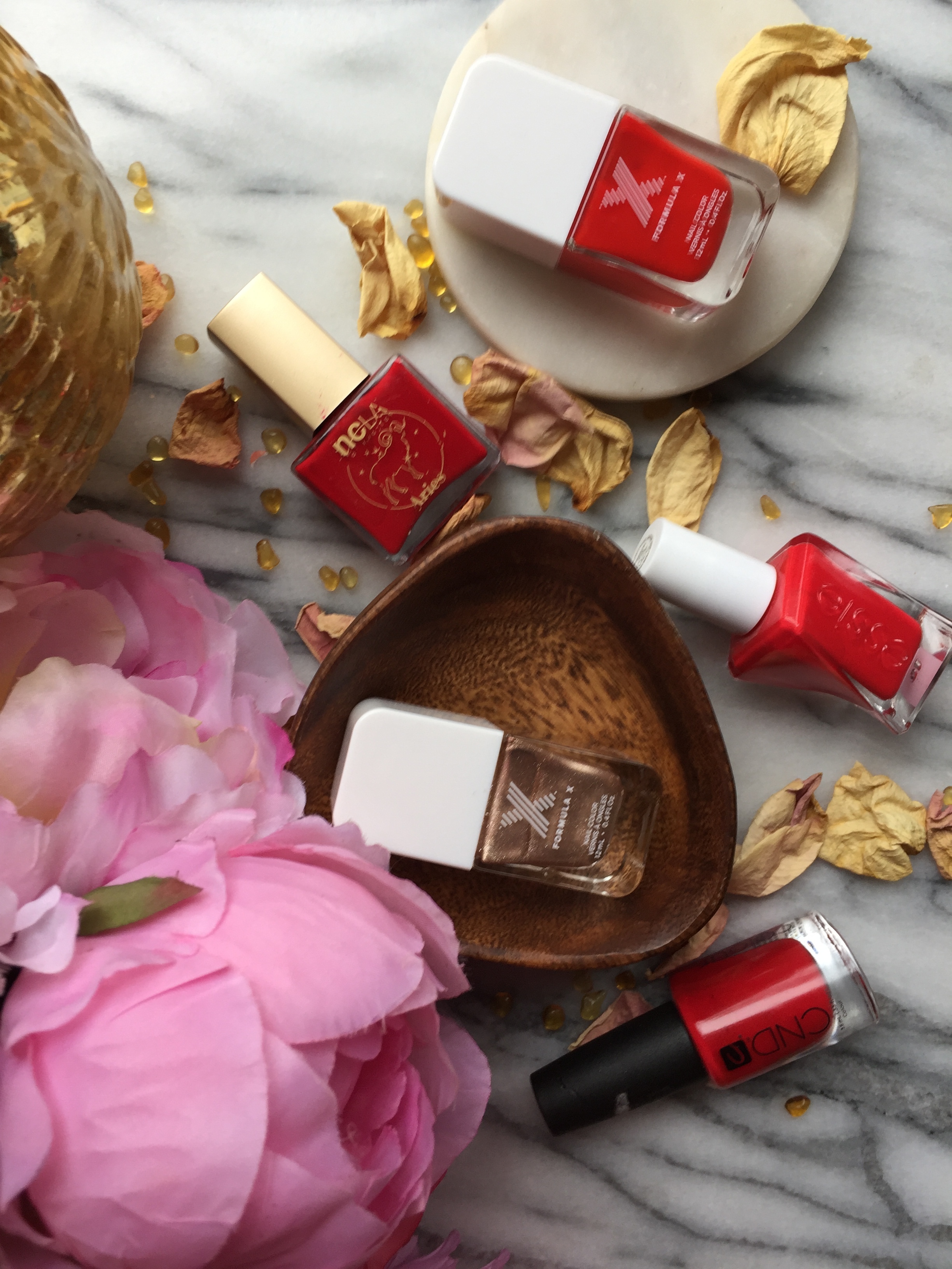 NCLA Aries, CND Rouge Red, Essie Rock The Runway, Formula X Haute Sauce and Formula X Revved Up