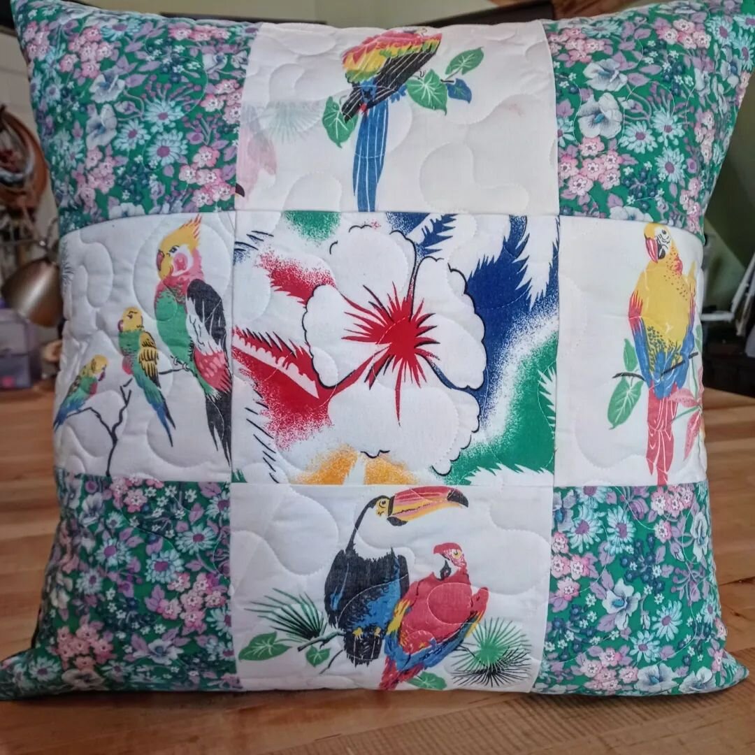 A companion pillow for the quilt from yesterday's post.  This pillow is made from a dress and a blouse, and I used the green outer border fabric from the quilt for the envelope back. The two look great together!

#finishedfibers #makingquiltedmemorie