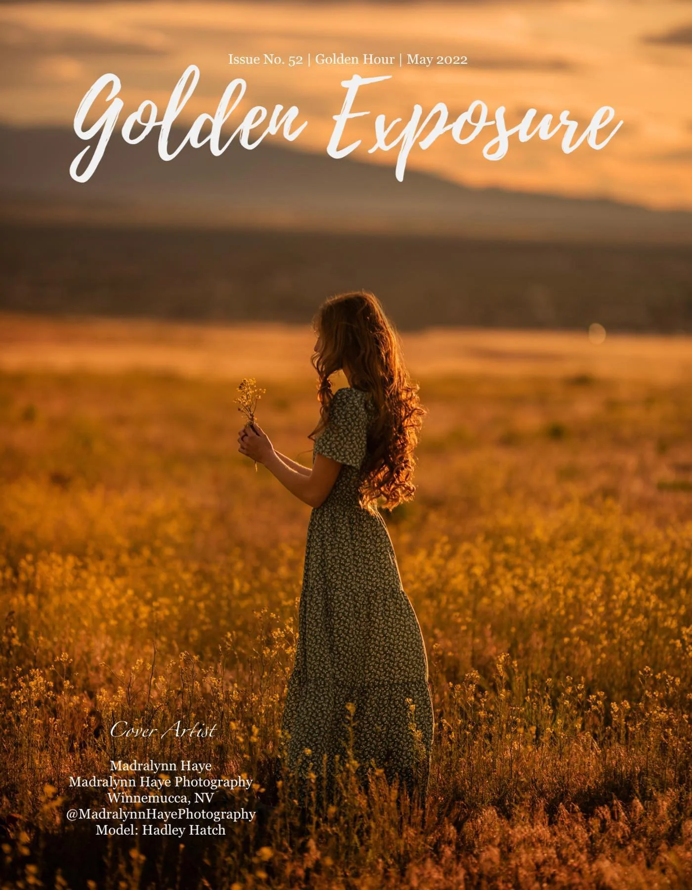 A woman with long, curly hair holding a flower stands in a field of yellow flowers during sunset, with a warm orange sky in the background.