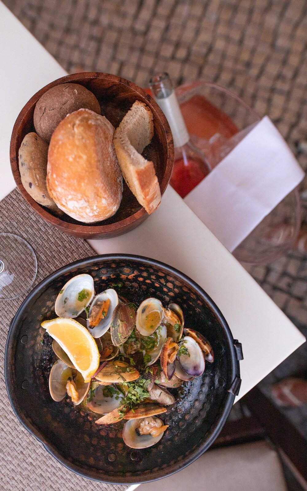 Bulhao Pato Clams cooked in Cataplana  sauteed in olive oil , garlic and coriandar