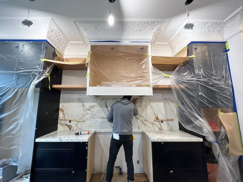 Toronto Home renovations - victorian style home - kitchen renovations - neoclassical kitchen with calacatta gold porcelain countertop and backsplash.jpg