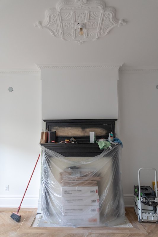 Toronto Home renovations - victorian style home - livingroom and fireplace repainting.jpg