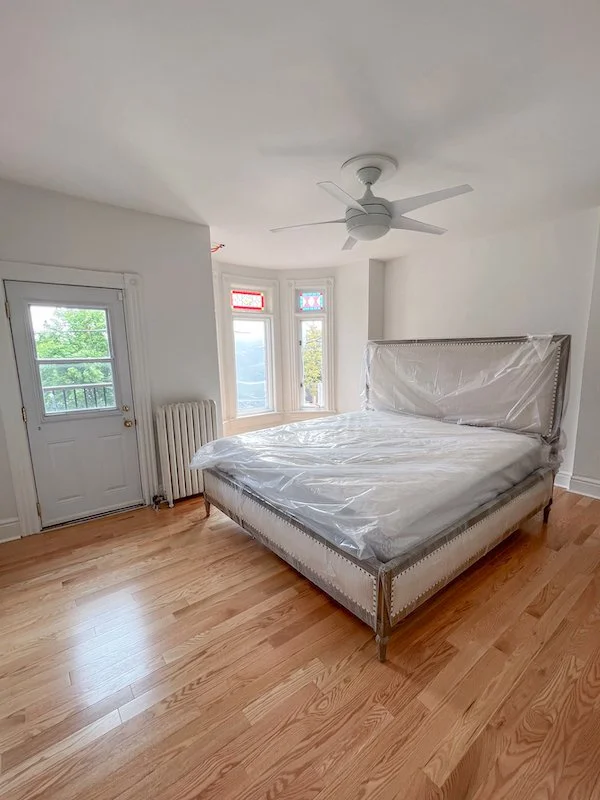 home renovations in toronto - master bedroom with stained glass front windows.jpg