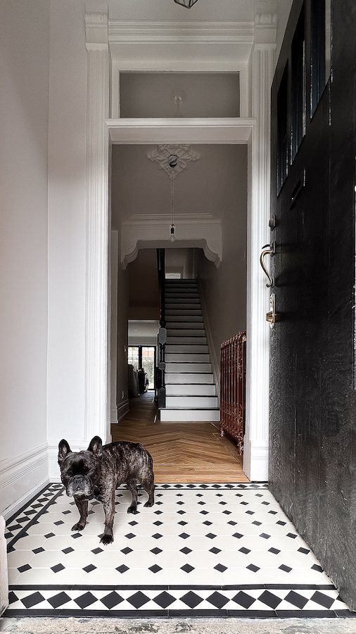 modern victorian house - home renovations toronto - victorian style house foyer tiles - winckelman tiles black and white victorian tiles with boarder design against herringbone floors-4.jpg