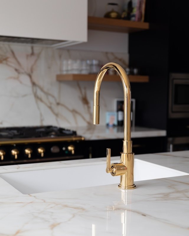 Toronto home renovations - renovating a victorian home - kitchen renovations Toronto - calacatta gold porcelain countertop with brass kitchen faucet - rohl faucets.jpg