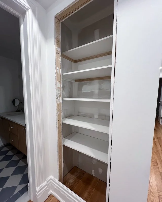 Linen Closet After Sheves Were Installed 