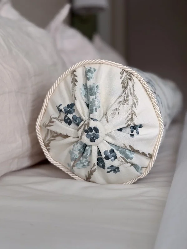 Bolster Pillows - DIY Bolster Pillow Cover and Insert - Bolster Pillow with Fabric Covered Buttons - master bedroom bedding and pillows - white linen with emoroidery detail