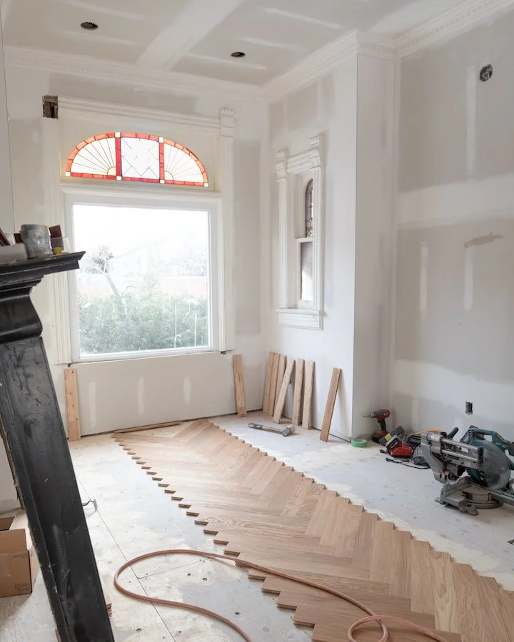 home renovations in Toronto - install herringbone flooring with brass inlay from chestnut flooring