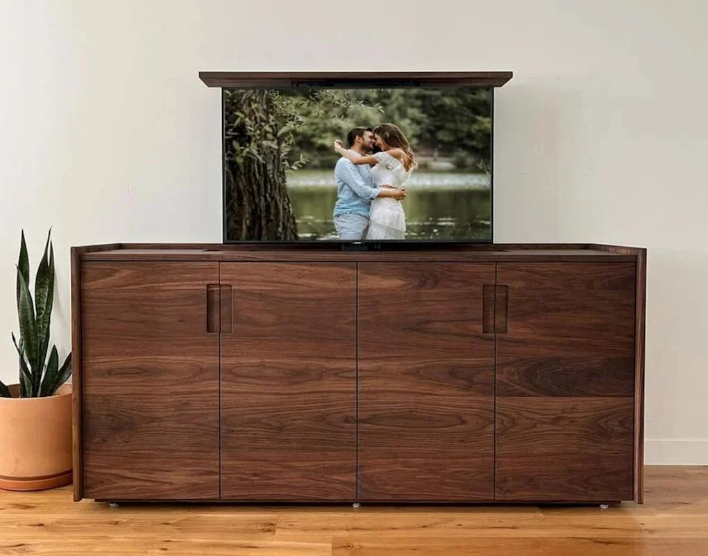2024 Interior Design Trends - clever ways to hid your TV - cabinet with motorized TV lift from Nexus 21