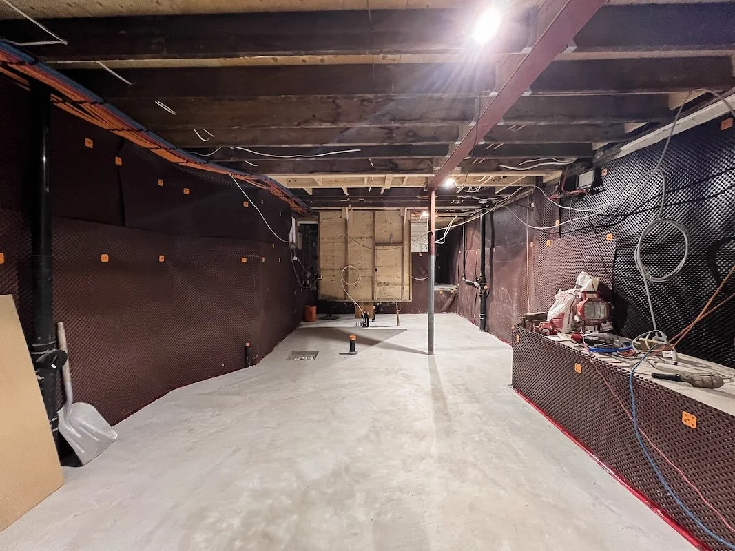 Home Renovations in Toronto - Underpinning foundation complete - pouring concrete floor in basement - ICY Reno - Basement renovation Toronto Complete - Structural engineer - Ken Davis engineer