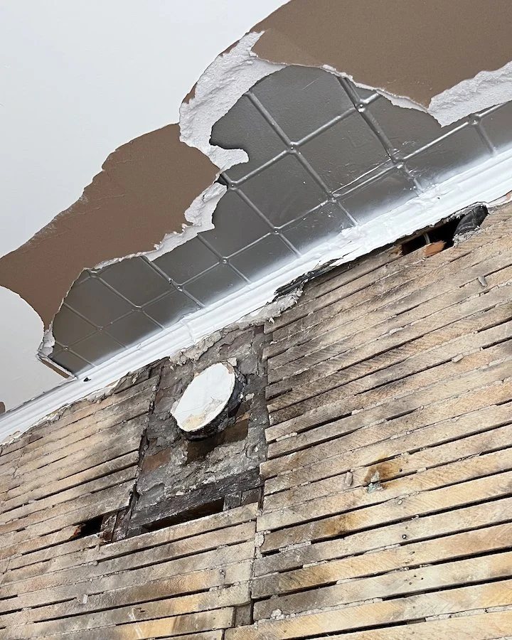 The faux tin ceiling we uncovered during the demolition of the main floor kitchen! Learn more in my Toronto Home renovation series on YouTube!