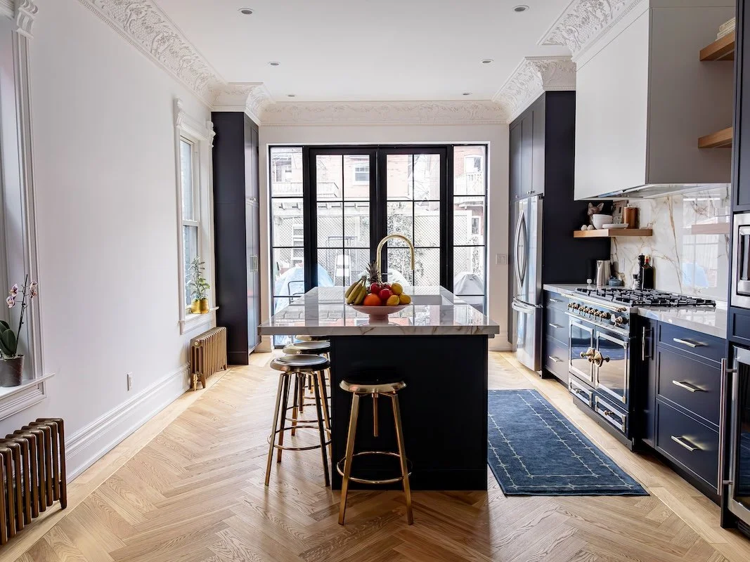 Toronto home renovations - renovating a victorian home - navy kitchen with slim shaker cabinets and la cornue range - la cornue kitchens