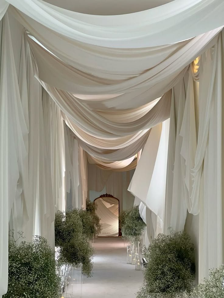 Interior Design Trends 2026 - dramatic drapery - wedding venue entrance - source pinterest