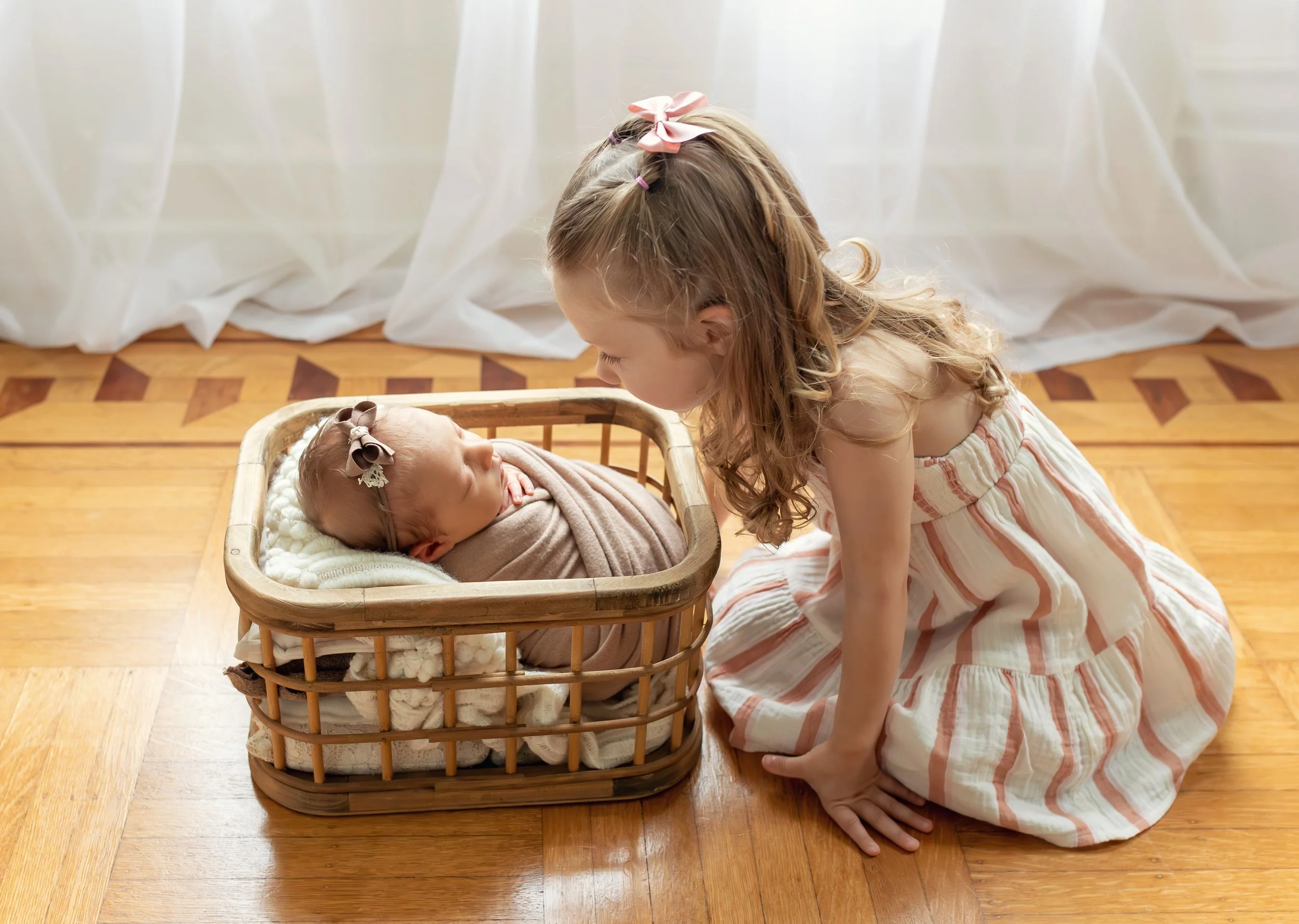 Newborn Basket Portrait with Big Sister