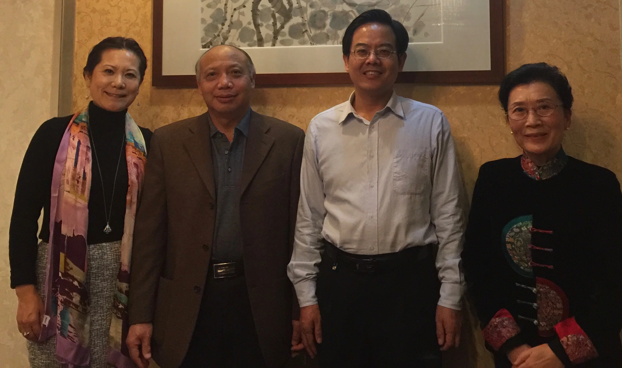 李岘与广东省作协蒋主席和暨大文学院程院长及作协顾问余惠芬教授合影