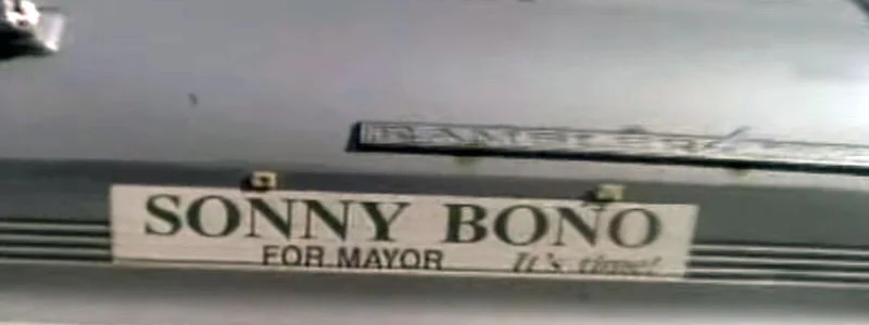 Note: this is not my office, but rather a screenshot of the same sticker in the music video for The Dead Milkmen's "Punk Rock Girl."