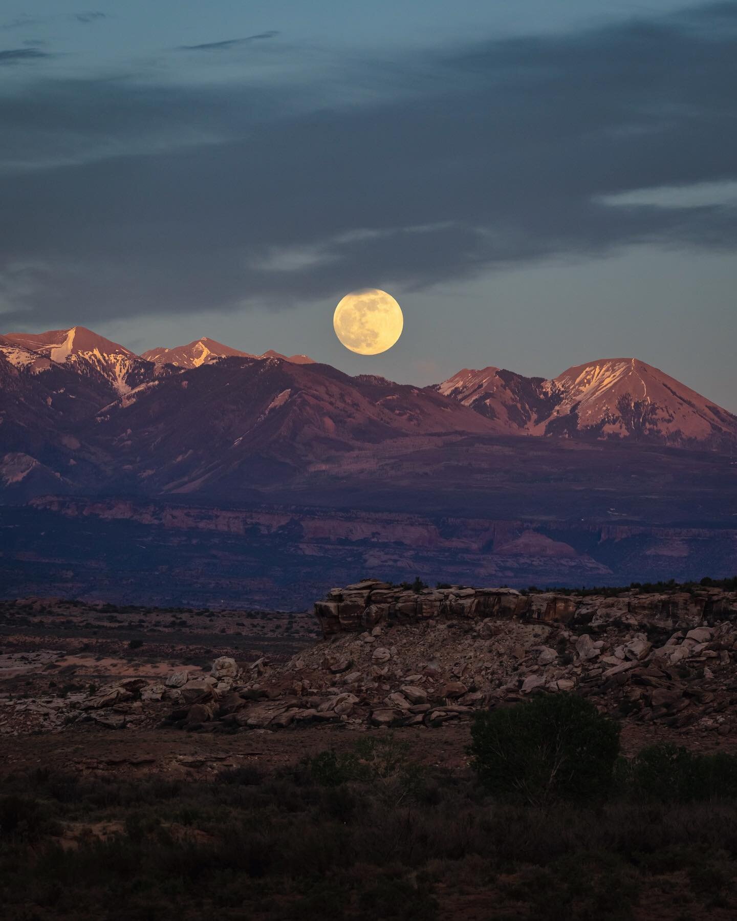 Moonrise over the La Sals. Didn&rsquo;t think I&rsquo;d be back here so soon, but here I am, drinking coffee and breathing the fresh post rain desert air.